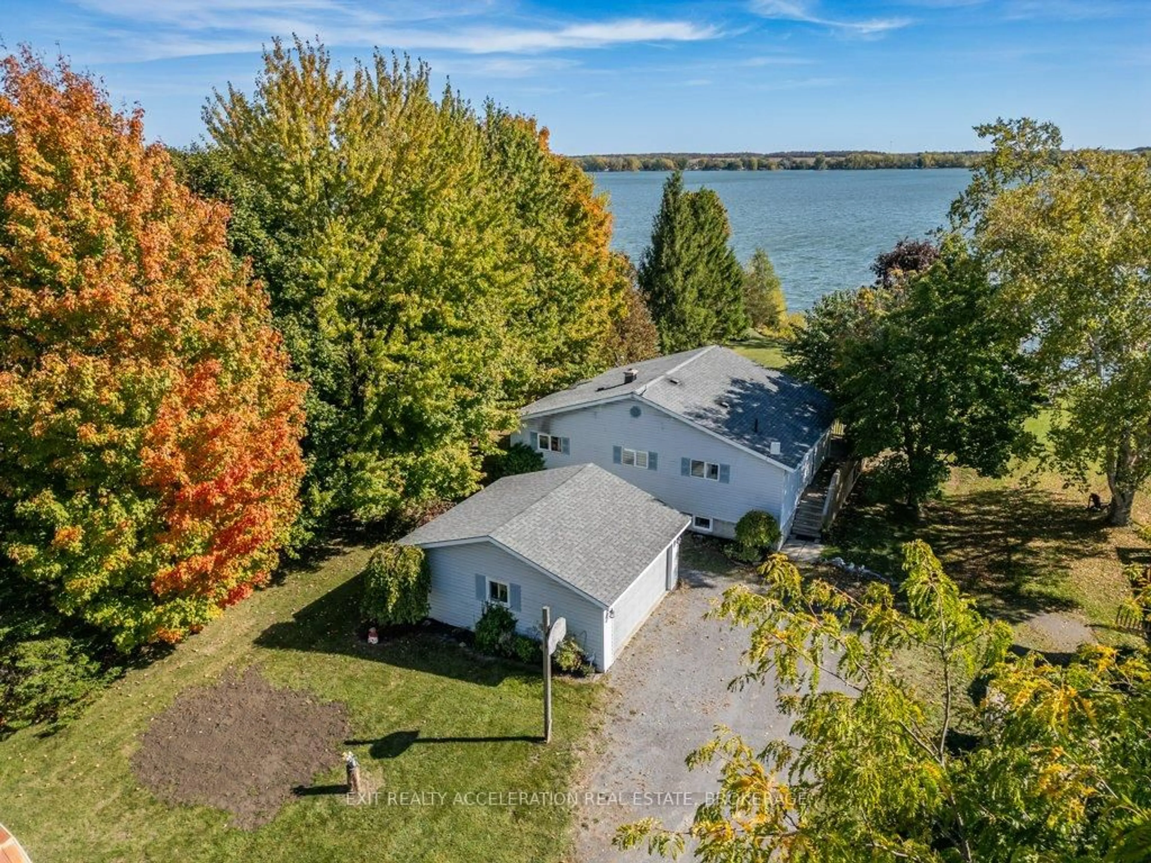 A pic from outside/outdoor area/front of a property/back of a property/a pic from drone, water/lake/river/ocean view for 122 Bayview Dr, Napanee Ontario K7R 3K8