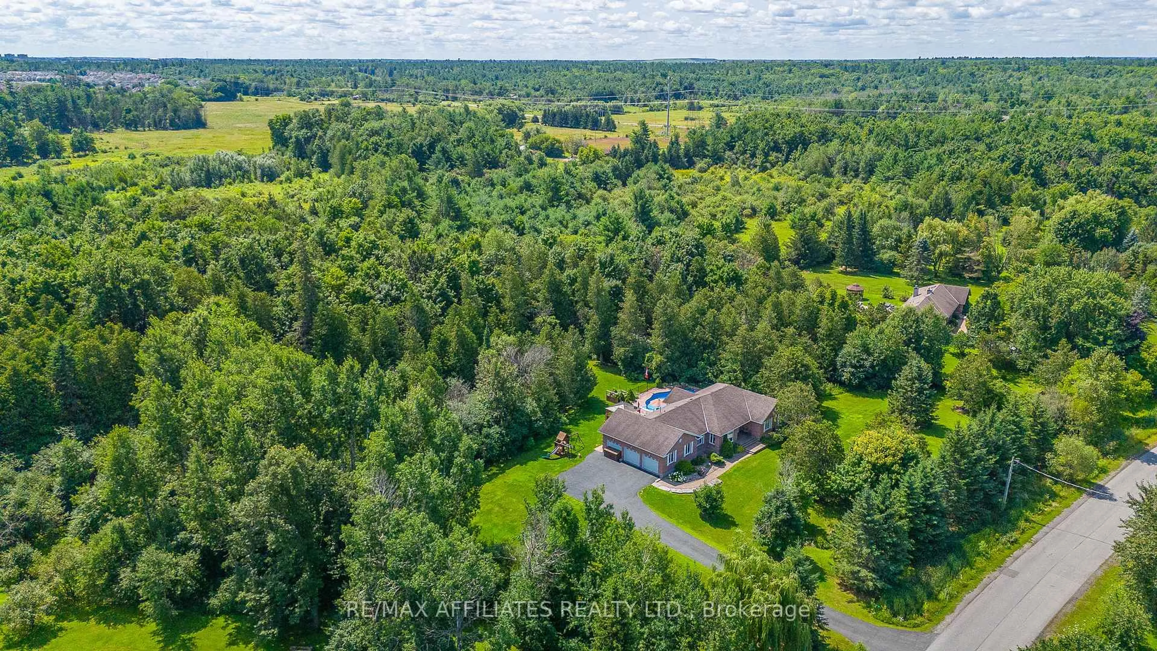 A pic from outside/outdoor area/front of a property/back of a property/a pic from drone, forest/trees view for 14 Panandrick View Dr, Ottawa Ontario K2W 1A5