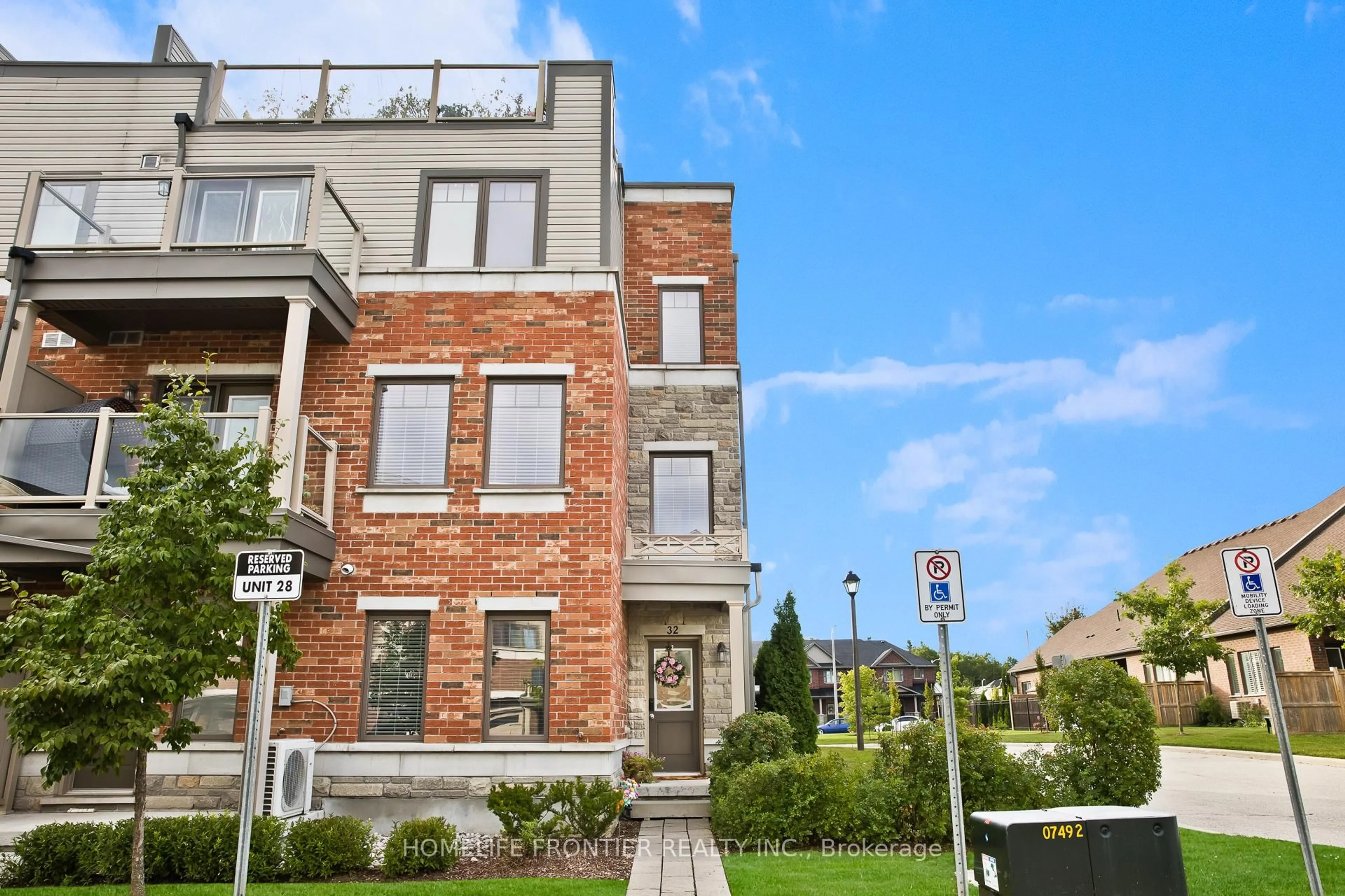 Home with brick exterior material, street for 39 Kay Cres #32, Guelph Ontario N1L 0N5