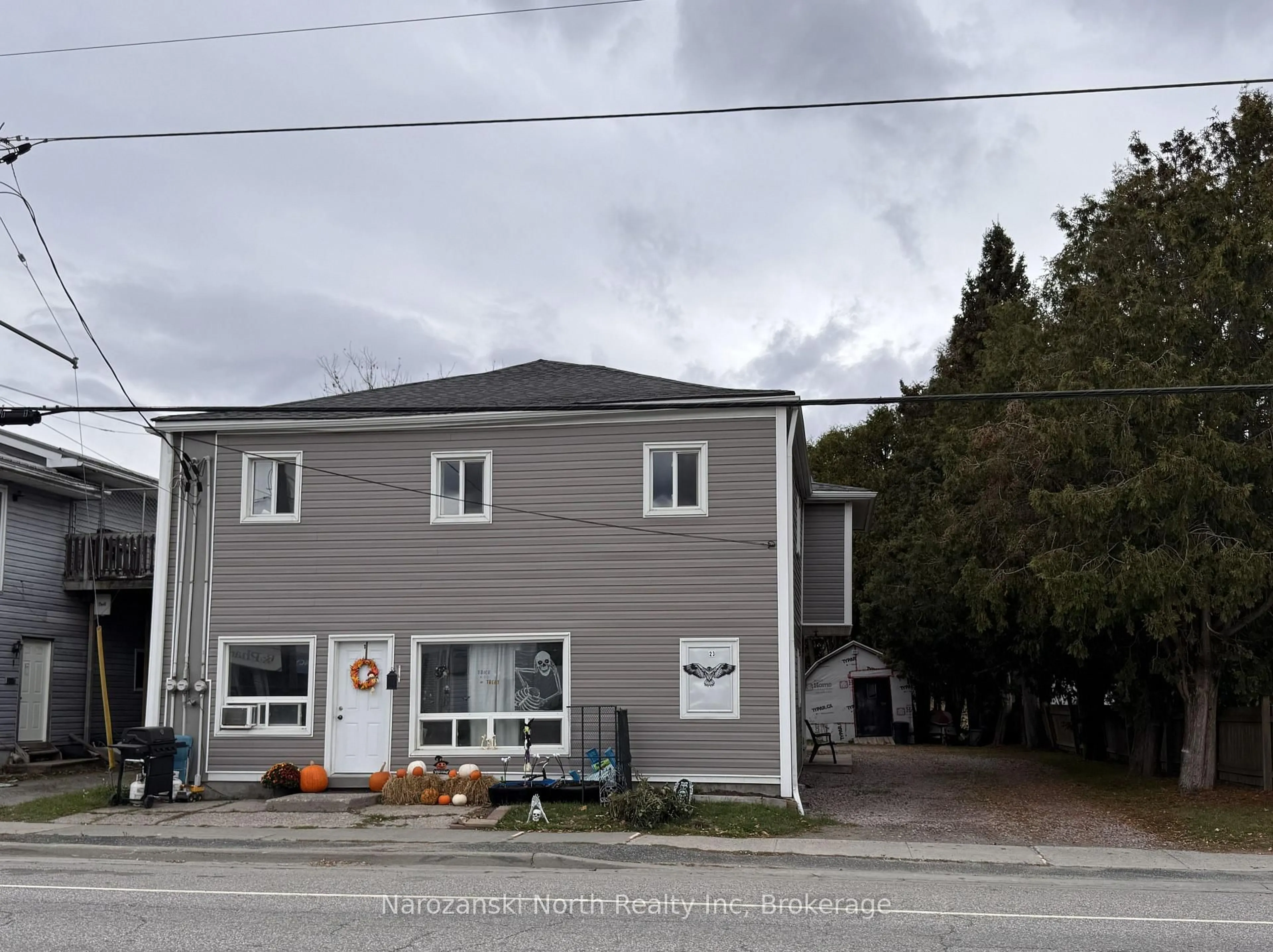 A pic from outside/outdoor area/front of a property/back of a property/a pic from drone, street for 23 St. David St, French River Ontario P0M 2N0