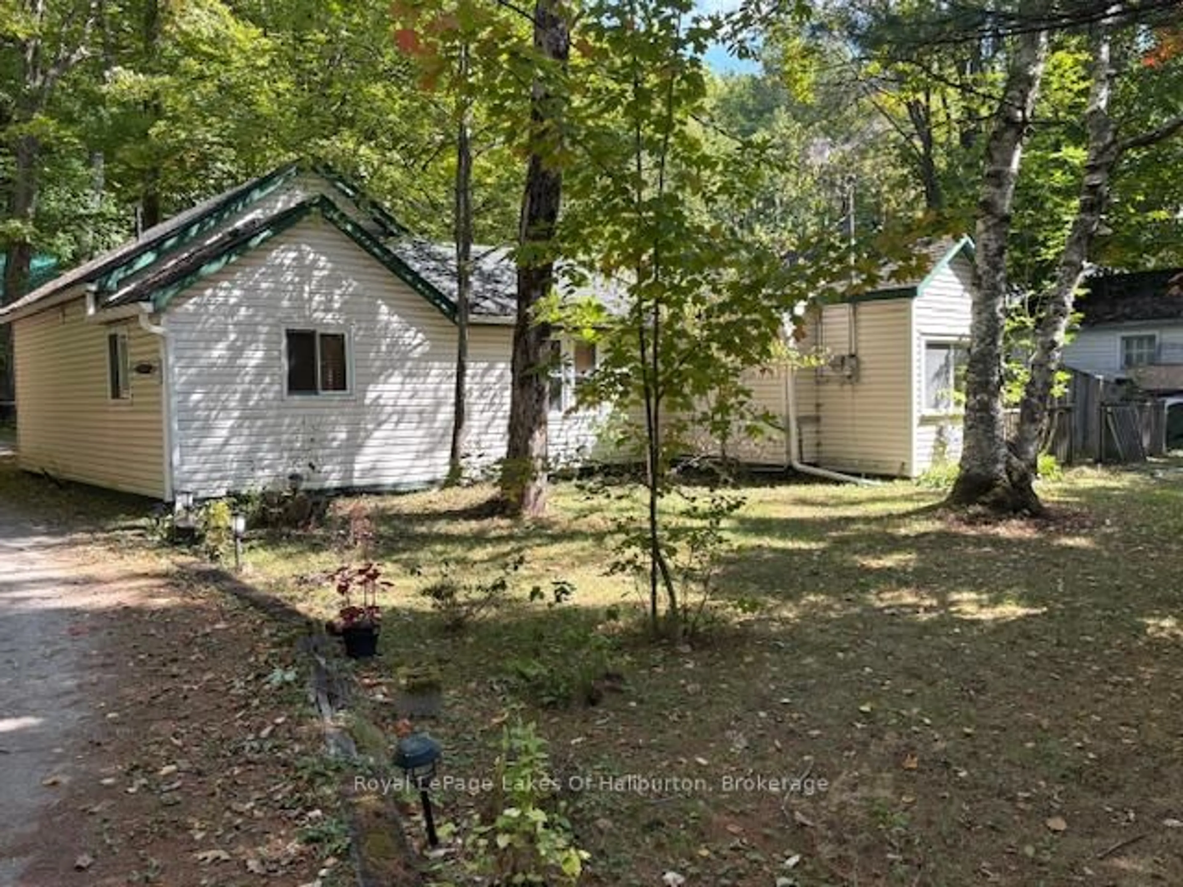 A pic from outside/outdoor area/front of a property/back of a property/a pic from drone, forest/trees view for 15588 Highway 35, Algonquin Highlands Ontario K0M 2K0