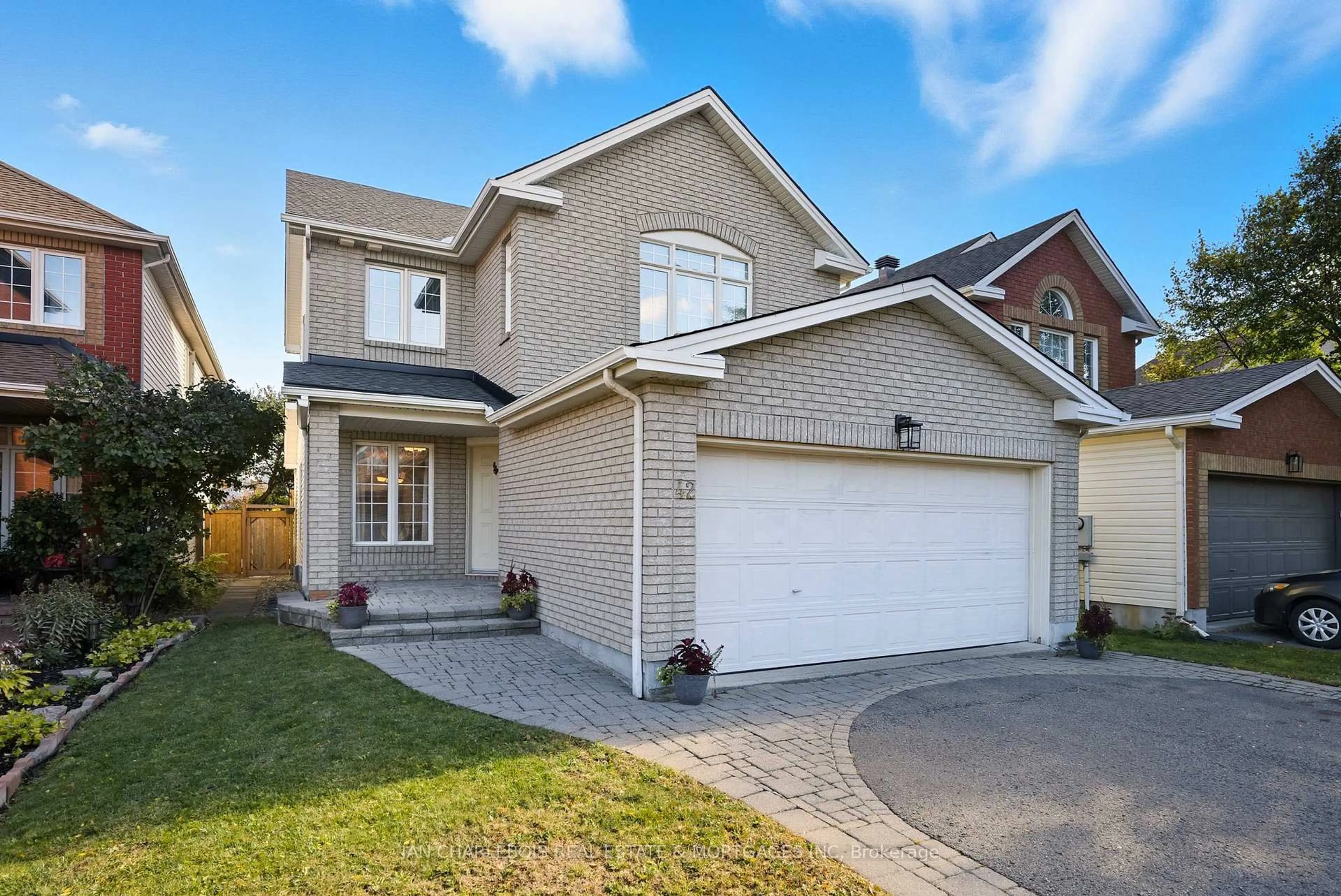 Home with brick exterior material, street for 42 Bellingham Pl, Ottawa Ontario K1T 4B2