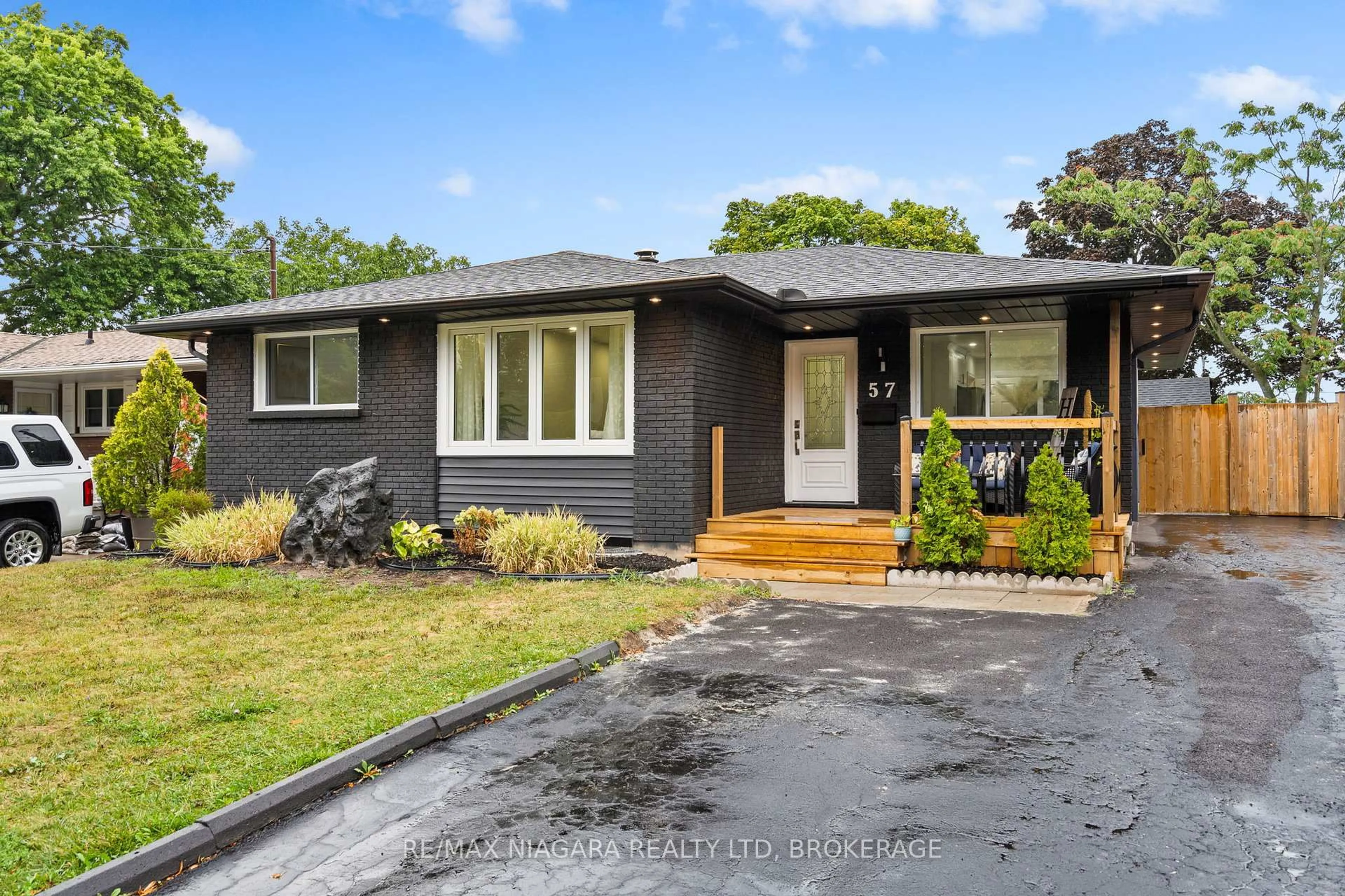 Home with brick exterior material, street for 57 Woodrow St, St. Catharines Ontario L2P 2A4