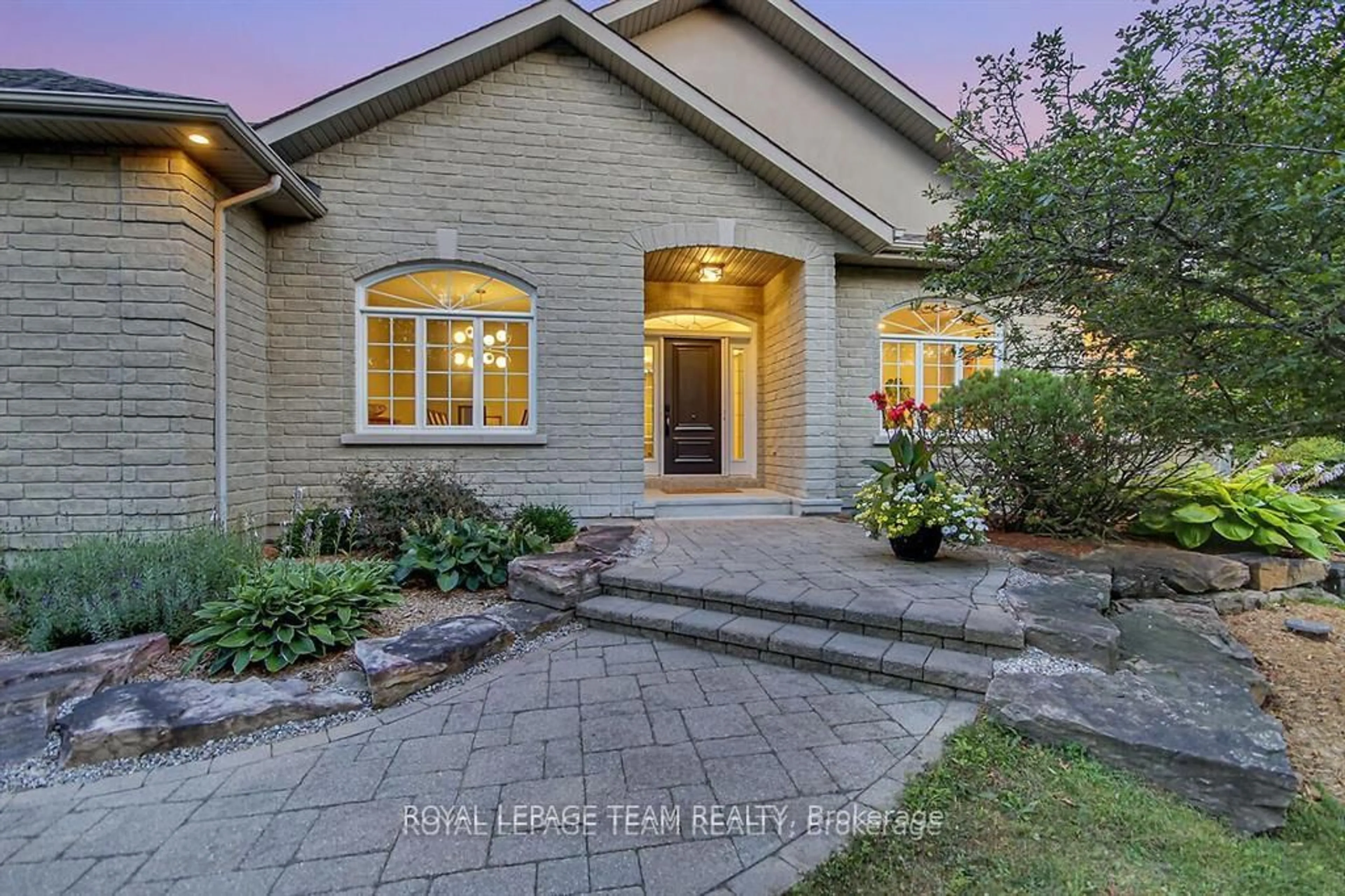 Home with brick exterior material, street for 6196 Elkwood Dr, Ottawa Ontario K4P 1M9