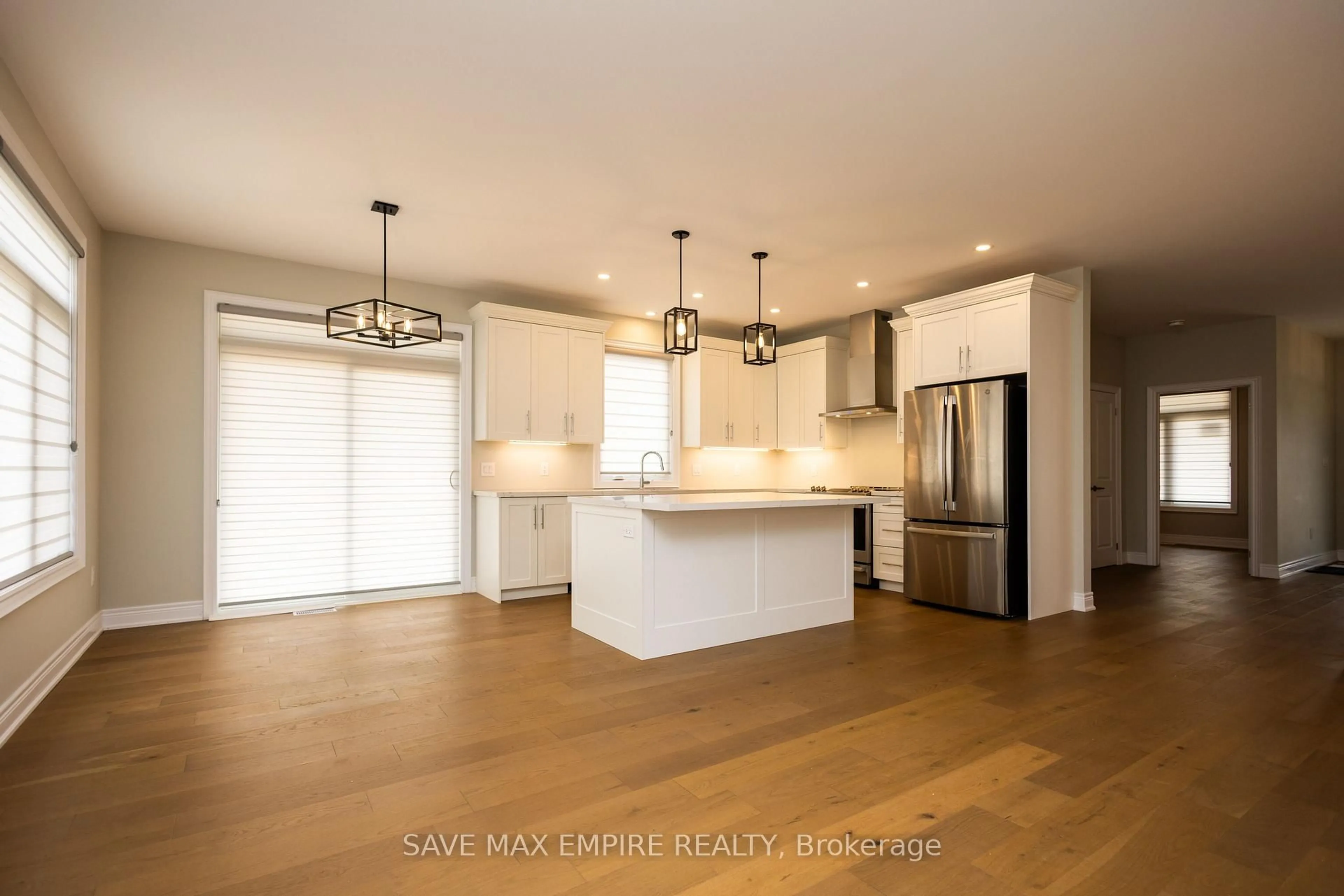 Open concept kitchen, wood/laminate floor for 3580 Canfield Cres, Fort Erie Ontario L0S 1S0