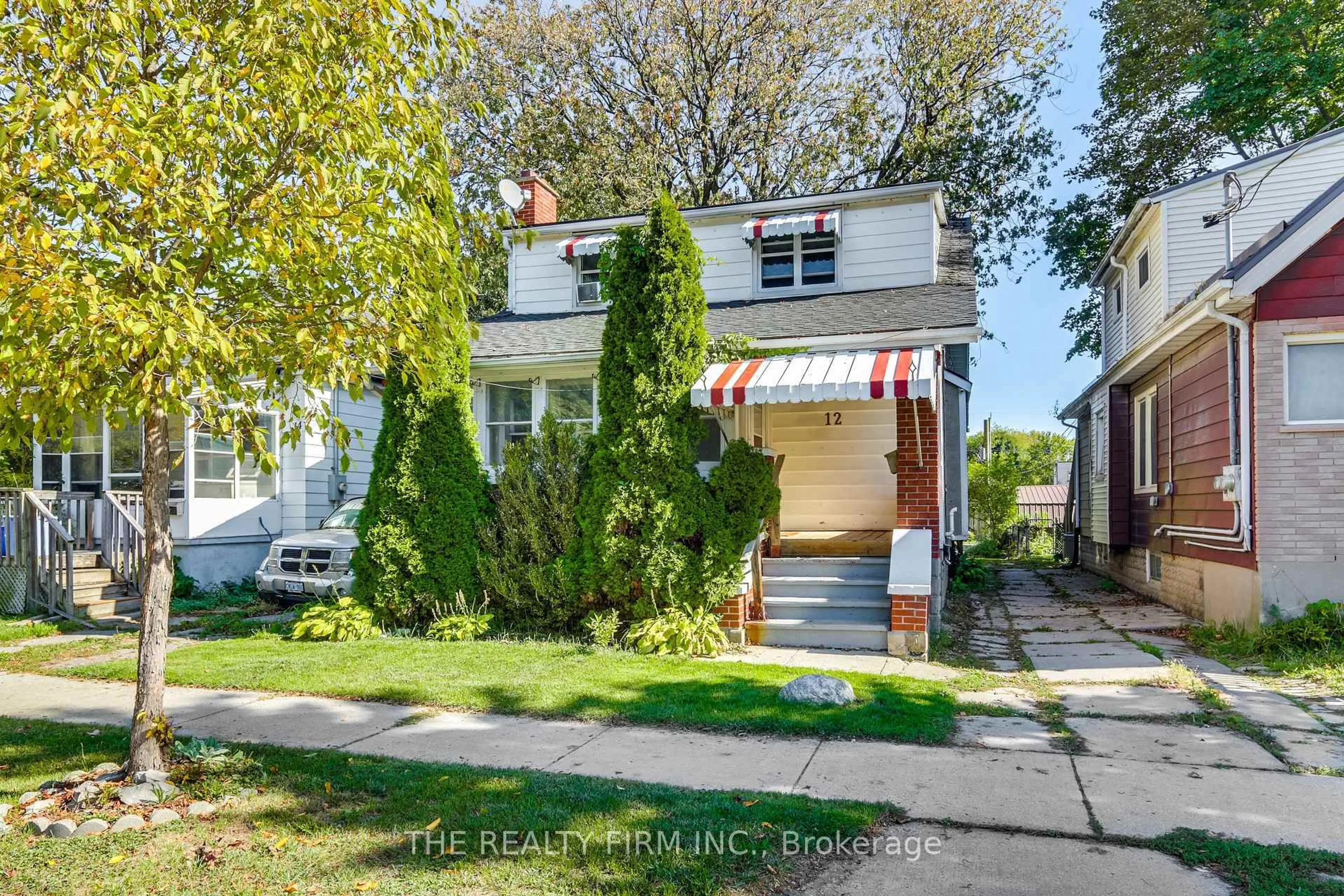 Home with vinyl exterior material, street for 12 Linwood St, London East Ontario N5Y 1W2