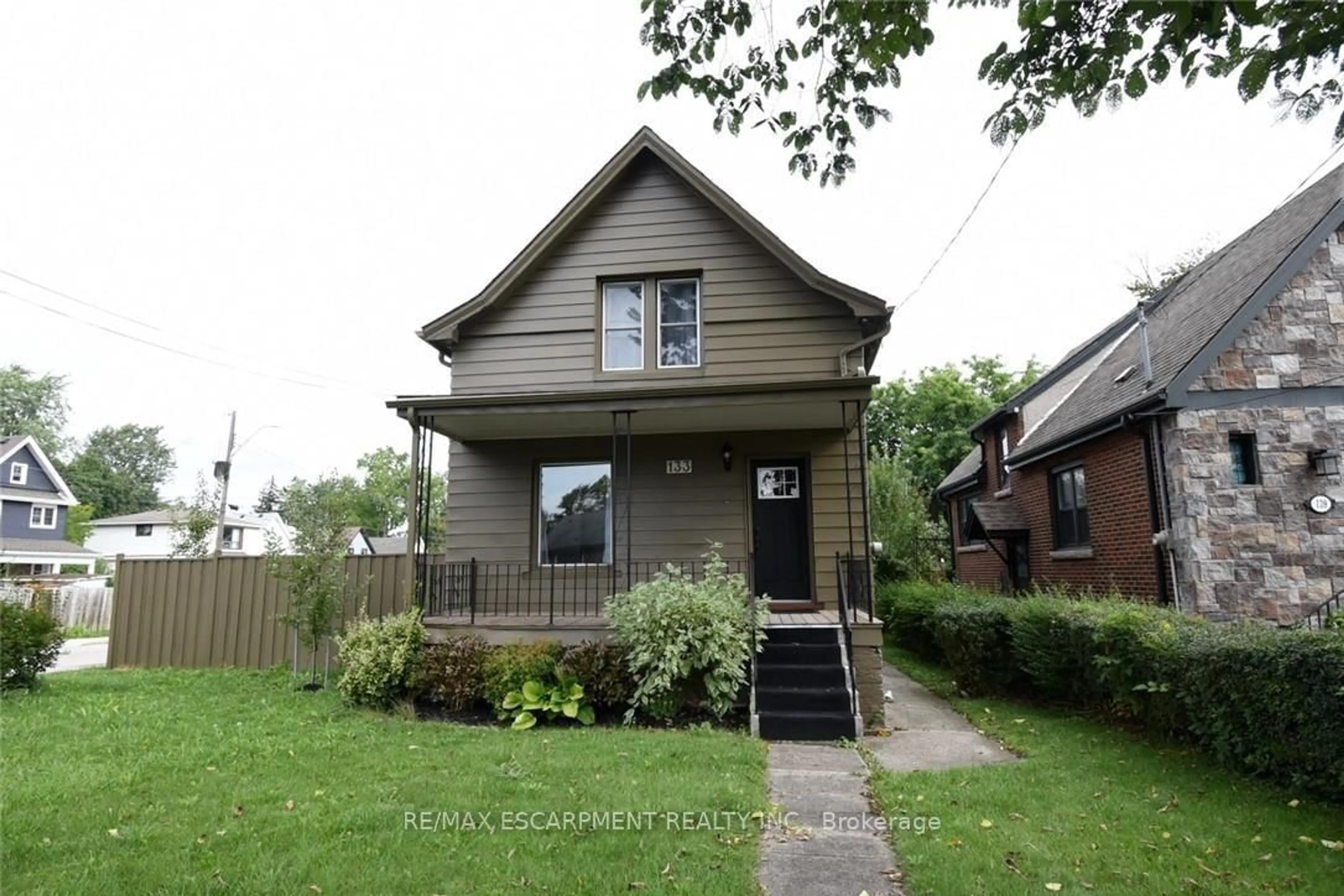 Home with brick exterior material, street for 133 Fennell Ave, Hamilton Ontario L9A 1S2