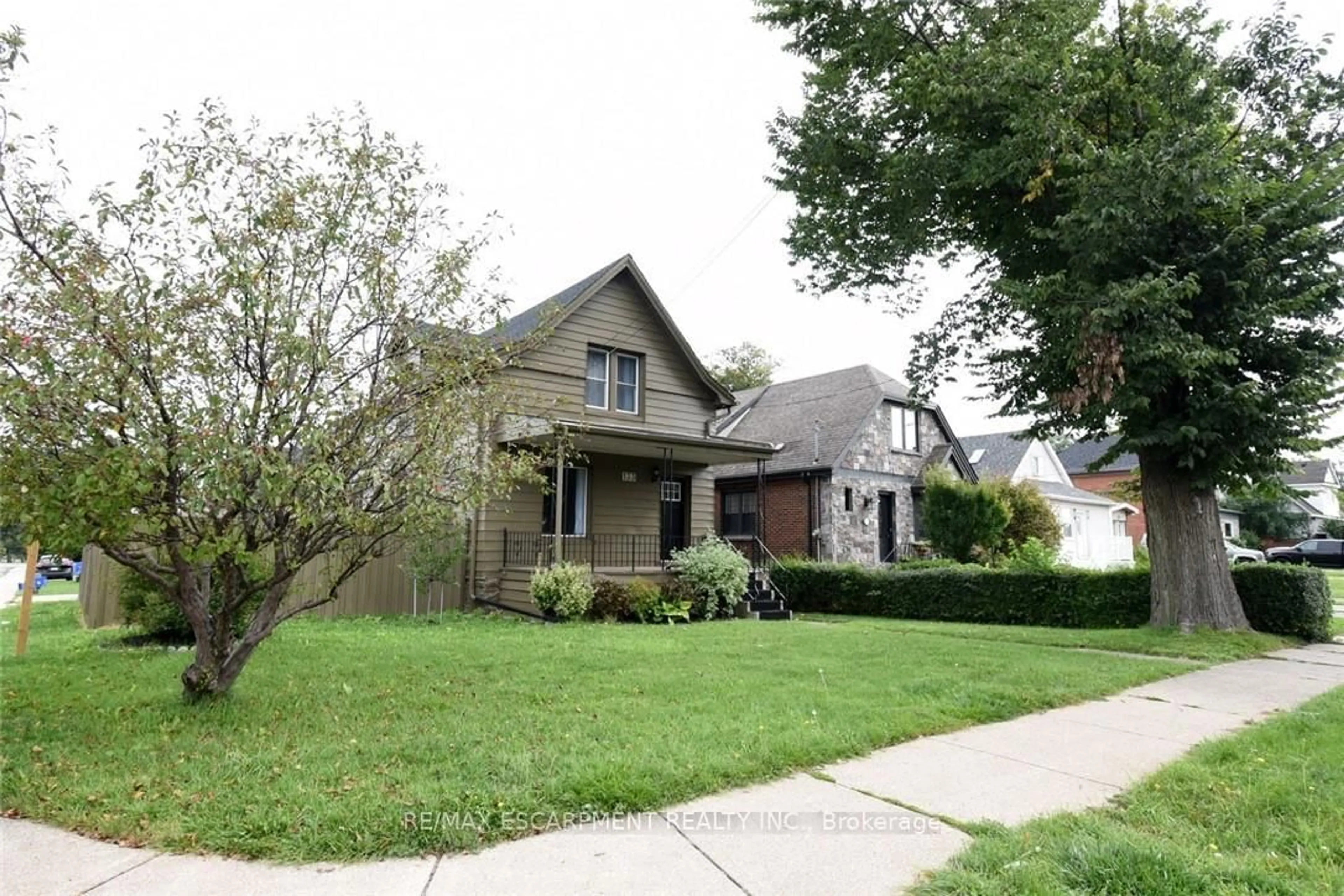 Home with brick exterior material, street for 133 Fennell Ave, Hamilton Ontario L9A 1S2
