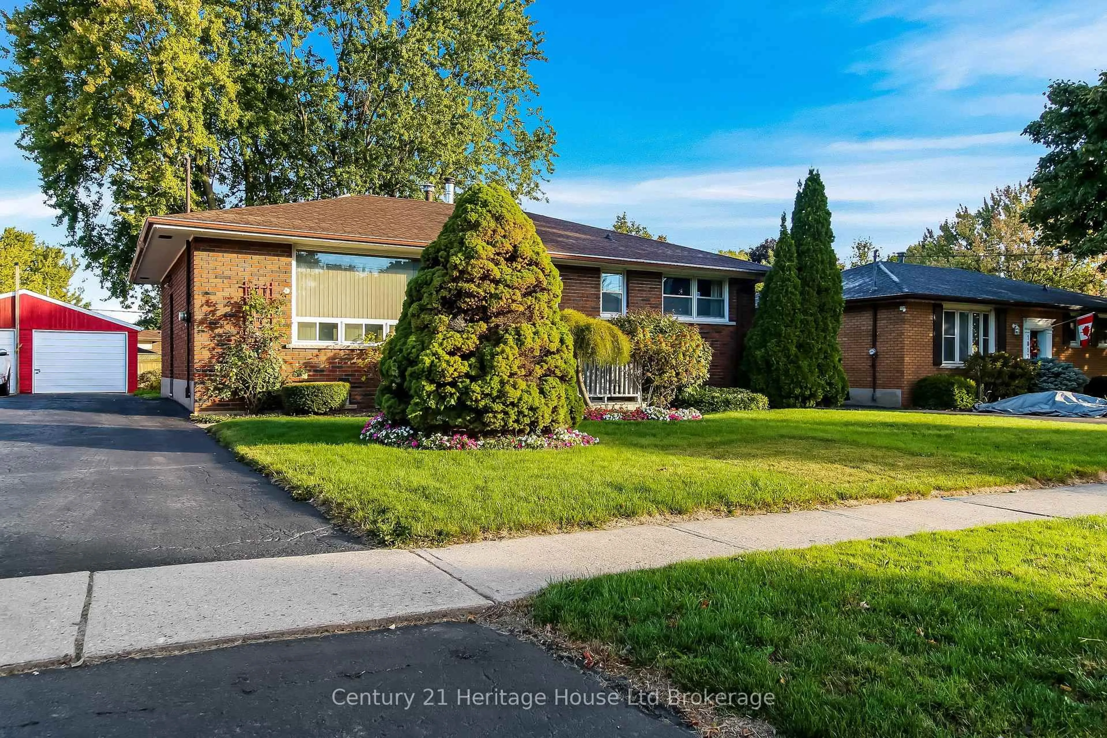Home with brick exterior material, street for 1009 Warwick St, Woodstock Ontario N4S 4S3