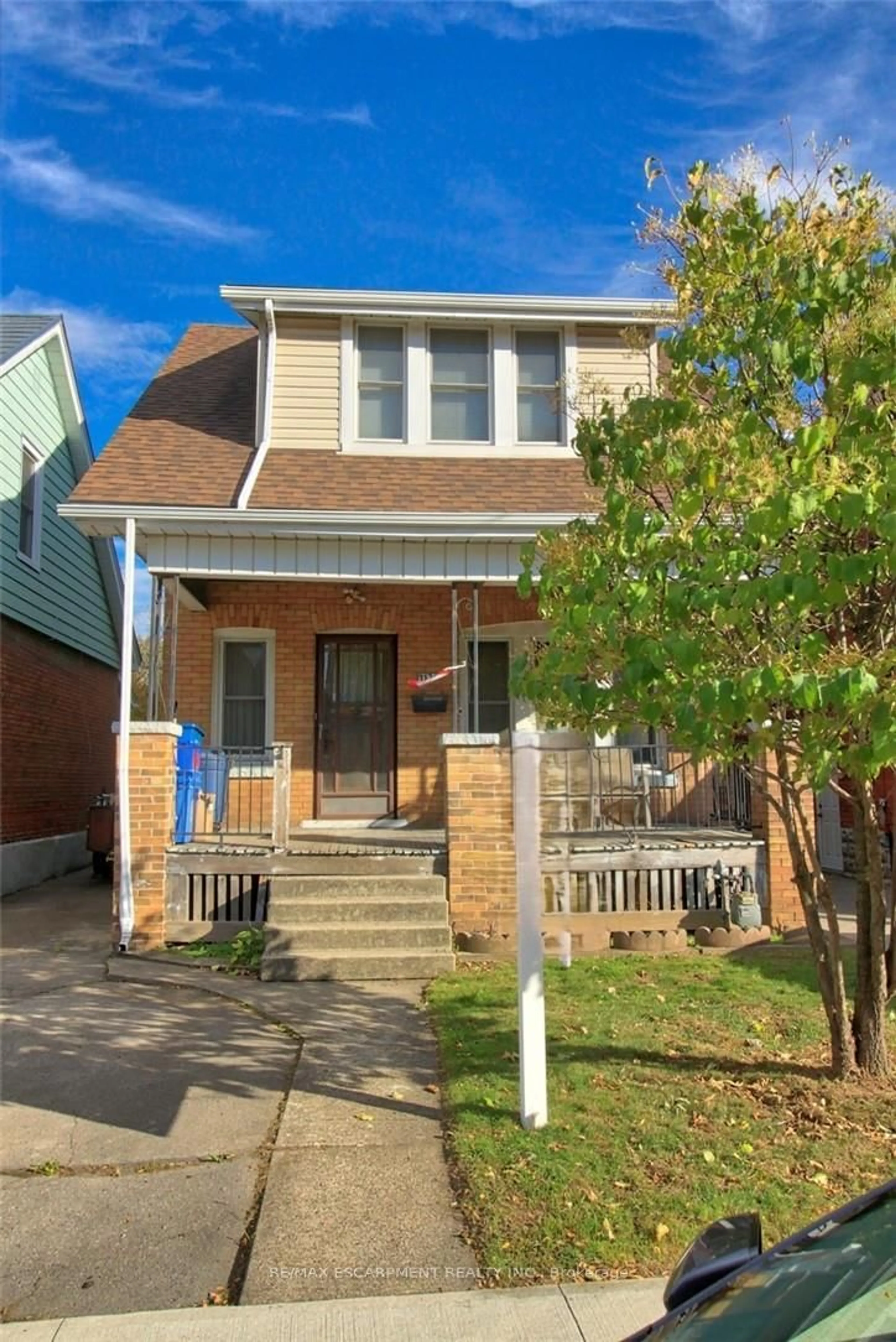 Home with brick exterior material, street for 112 Kensington Ave, Hamilton Ontario L8L 7N2