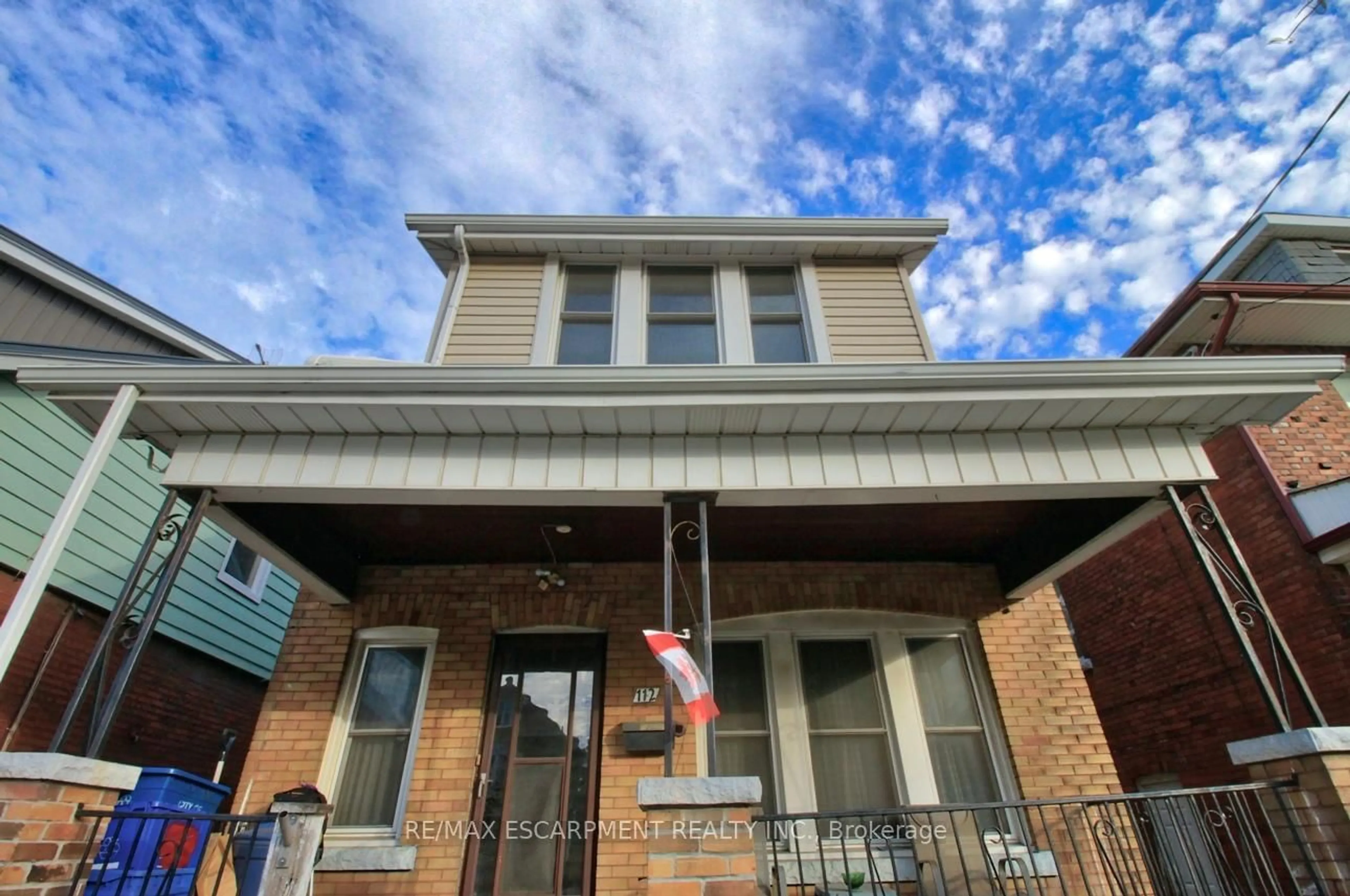 Home with brick exterior material, street for 112 Kensington Ave, Hamilton Ontario L8L 7N2