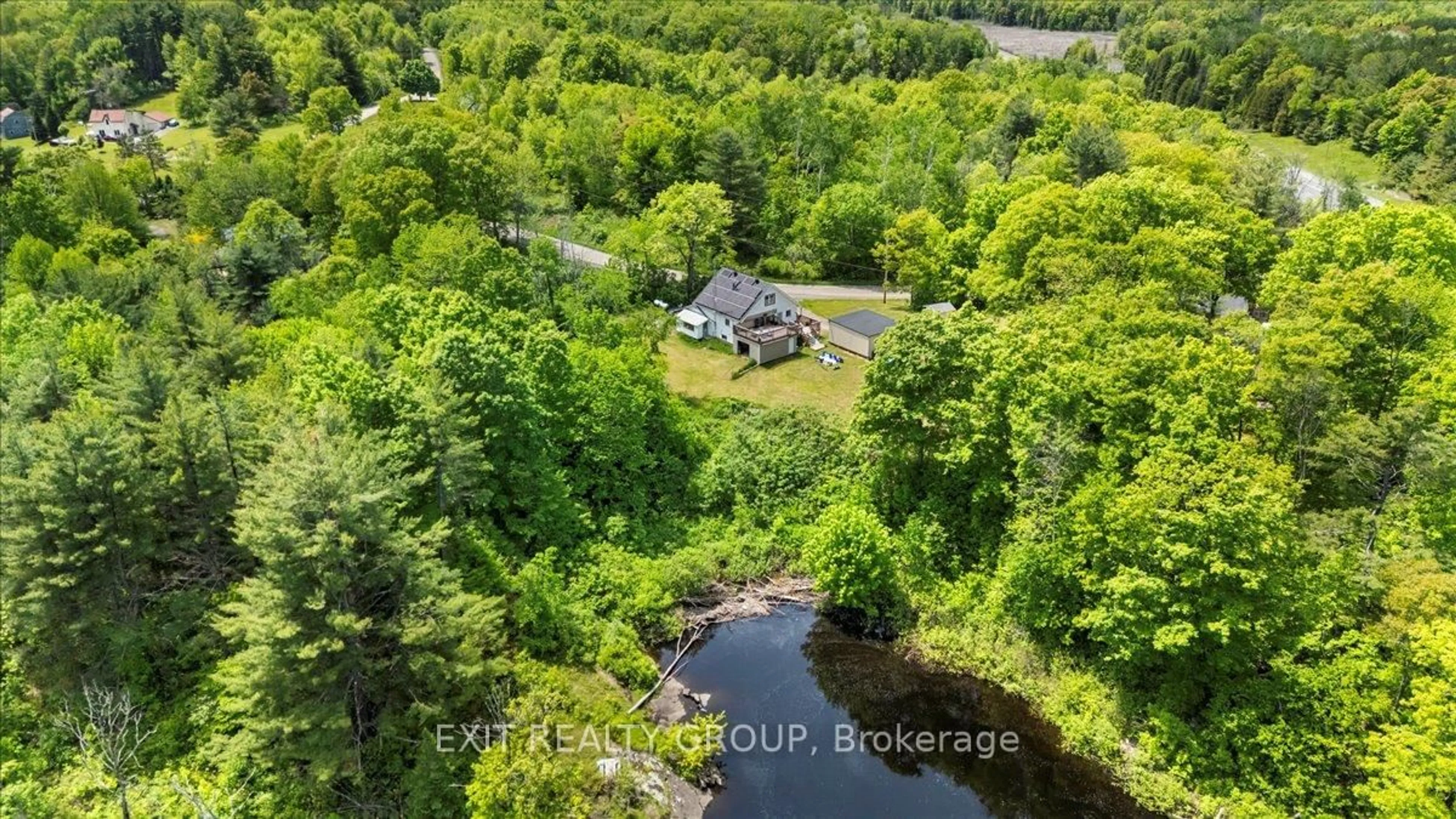 A pic from outside/outdoor area/front of a property/back of a property/a pic from drone, water/lake/river/ocean view for 330 Black River Rd, Tweed Ontario K0K 3J0