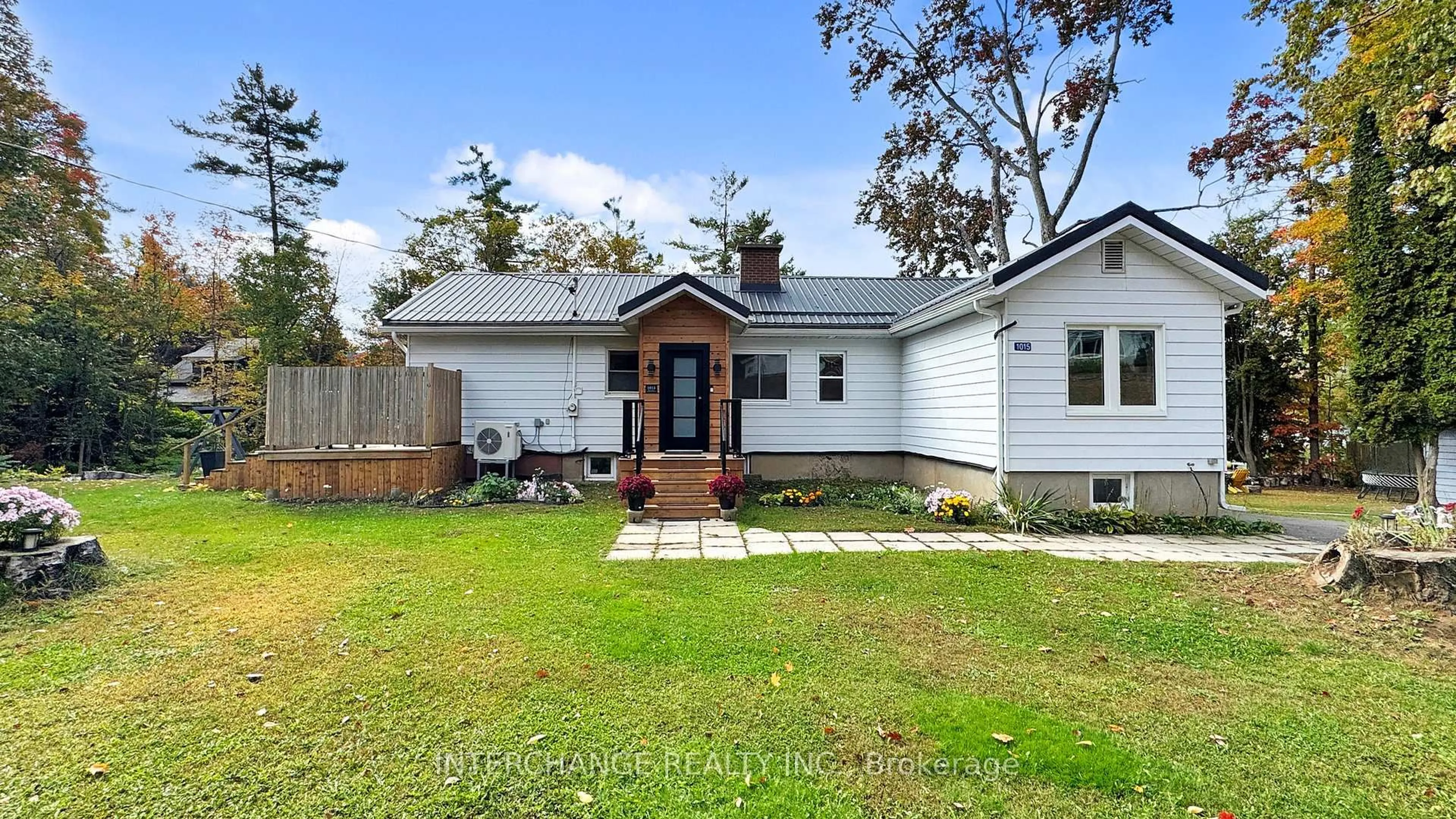 Home with vinyl exterior material, street for 1015 River St, Muskoka Lakes Ontario P0C 1A0