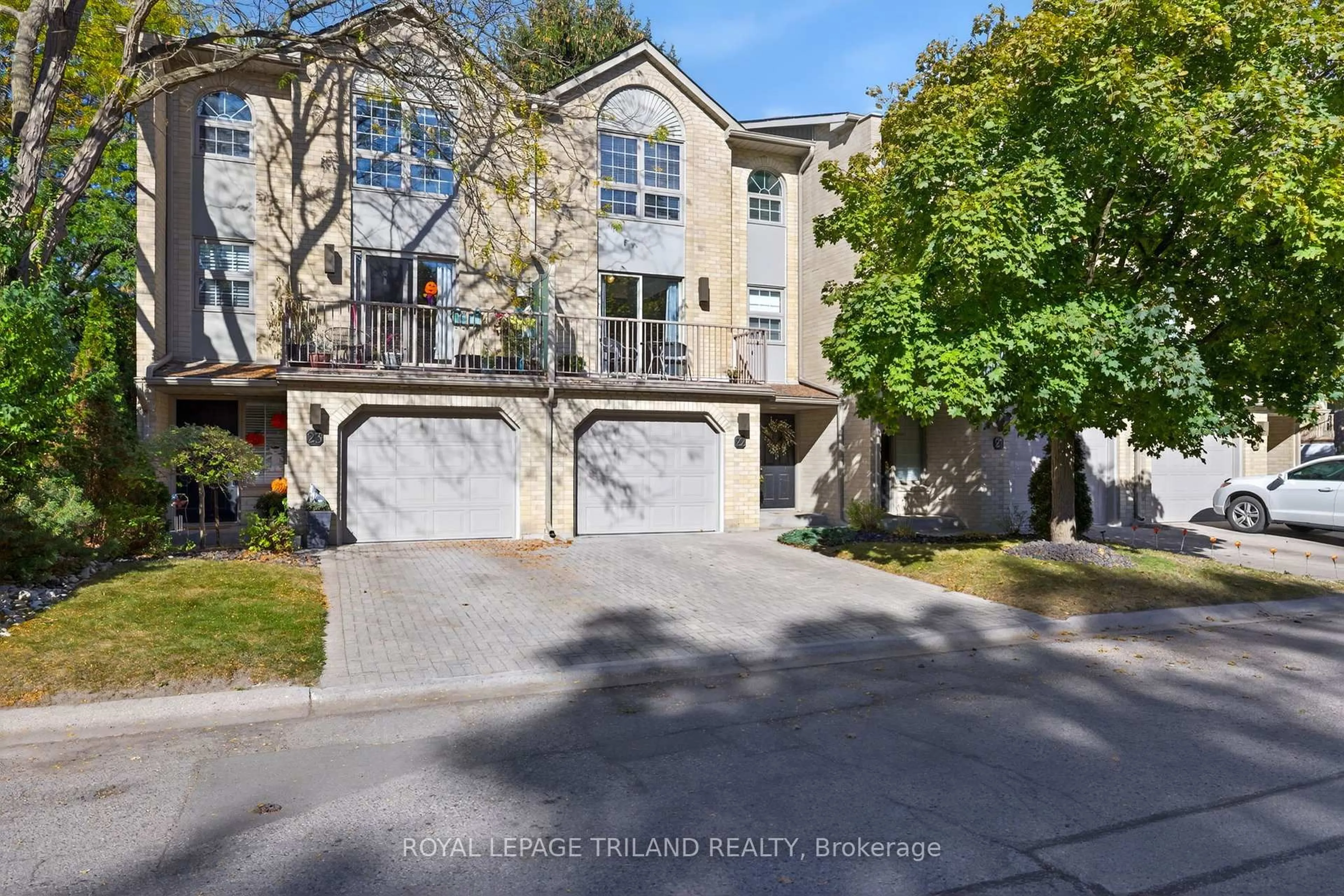 A pic from outside/outdoor area/front of a property/back of a property/a pic from drone, street for 1399 Commissioners Rd #22, London South Ontario N6K 4G9
