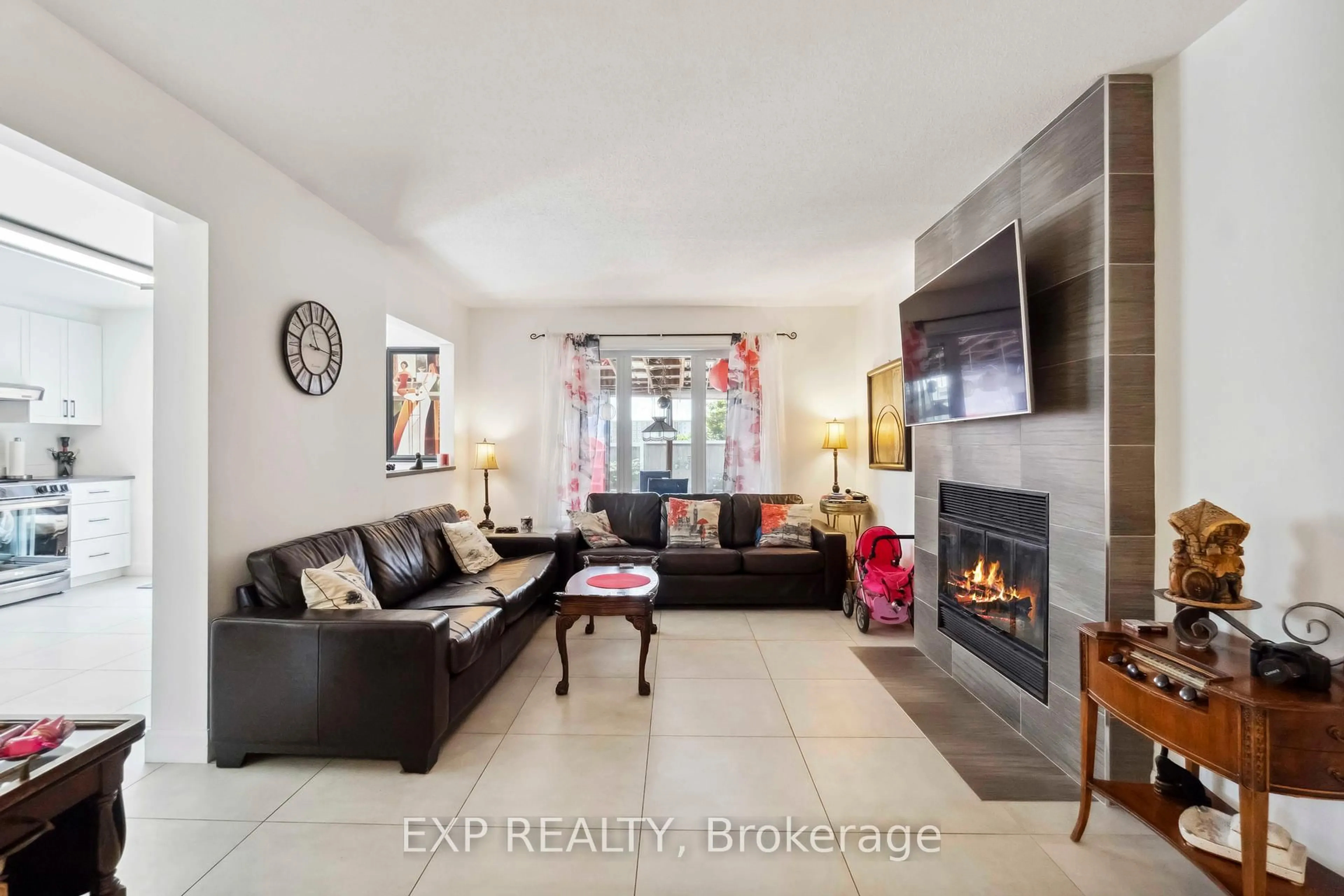 Living room with furniture, ceramic/tile floor for 2092 Legrand Cres, Ottawa Ontario K1E 3T6