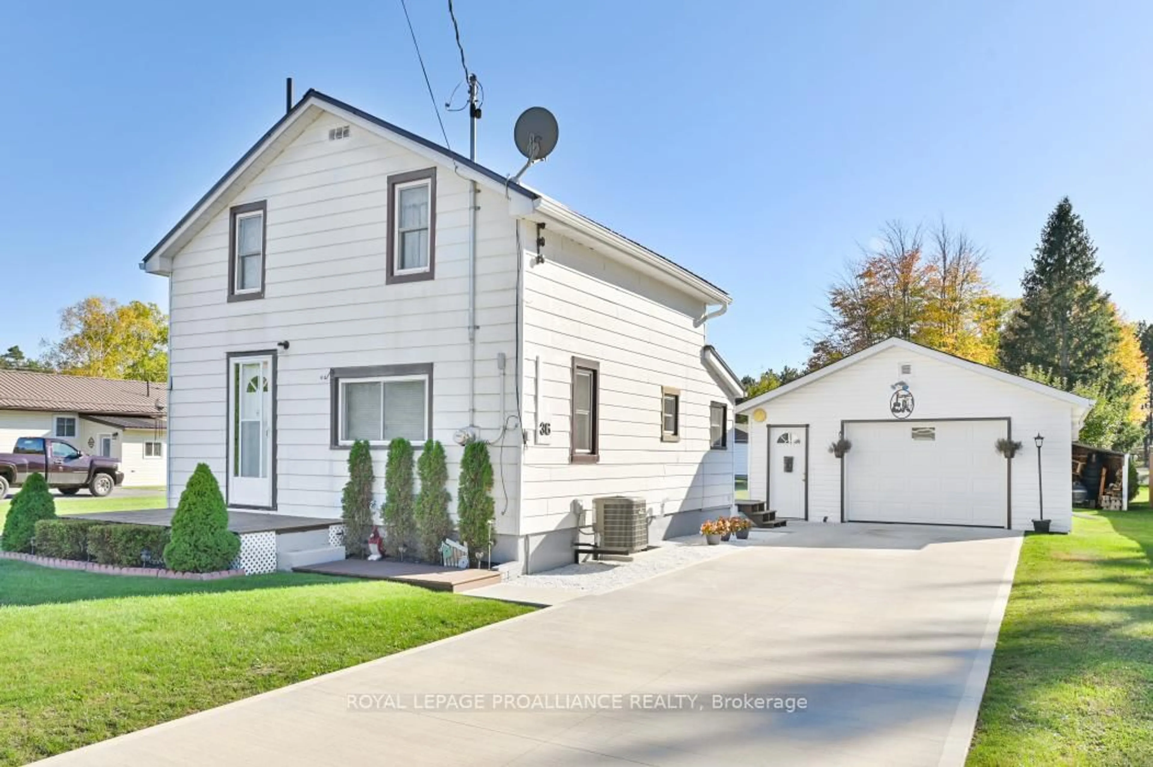 Home with vinyl exterior material, street for 36 Jones St, Kaladar Ontario K0H 1P0