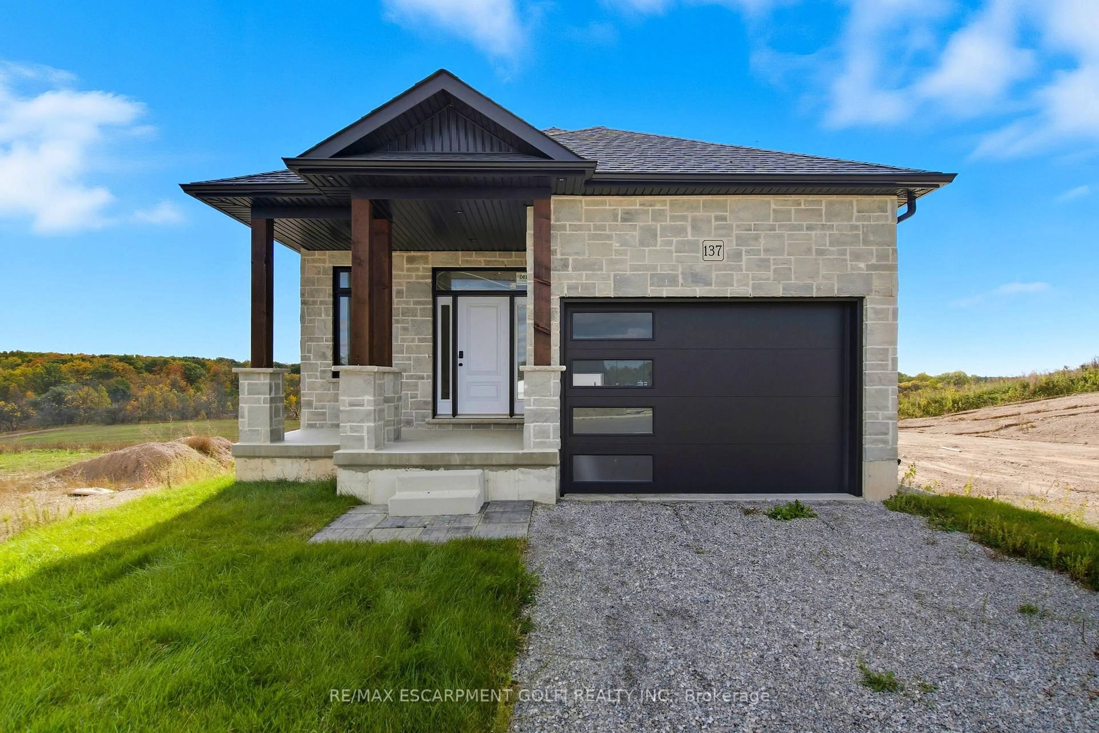 Home with brick exterior material, street for 137 Pike Creek Dr, Haldimand Ontario N0E 1E0