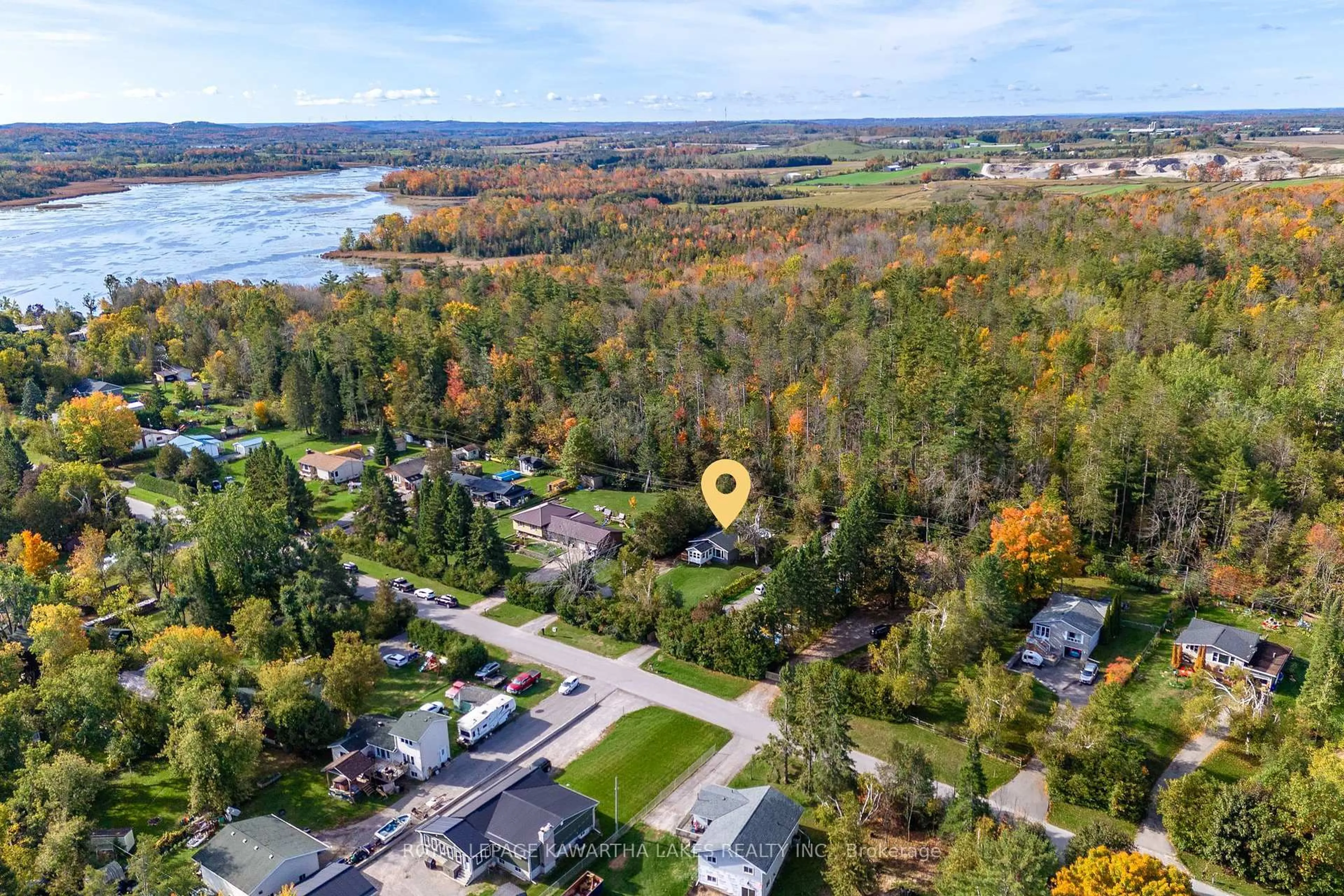 A pic from outside/outdoor area/front of a property/back of a property/a pic from drone, water/lake/river/ocean view for 35 Woods Ave, Kawartha Lakes Ontario K0L 2W0