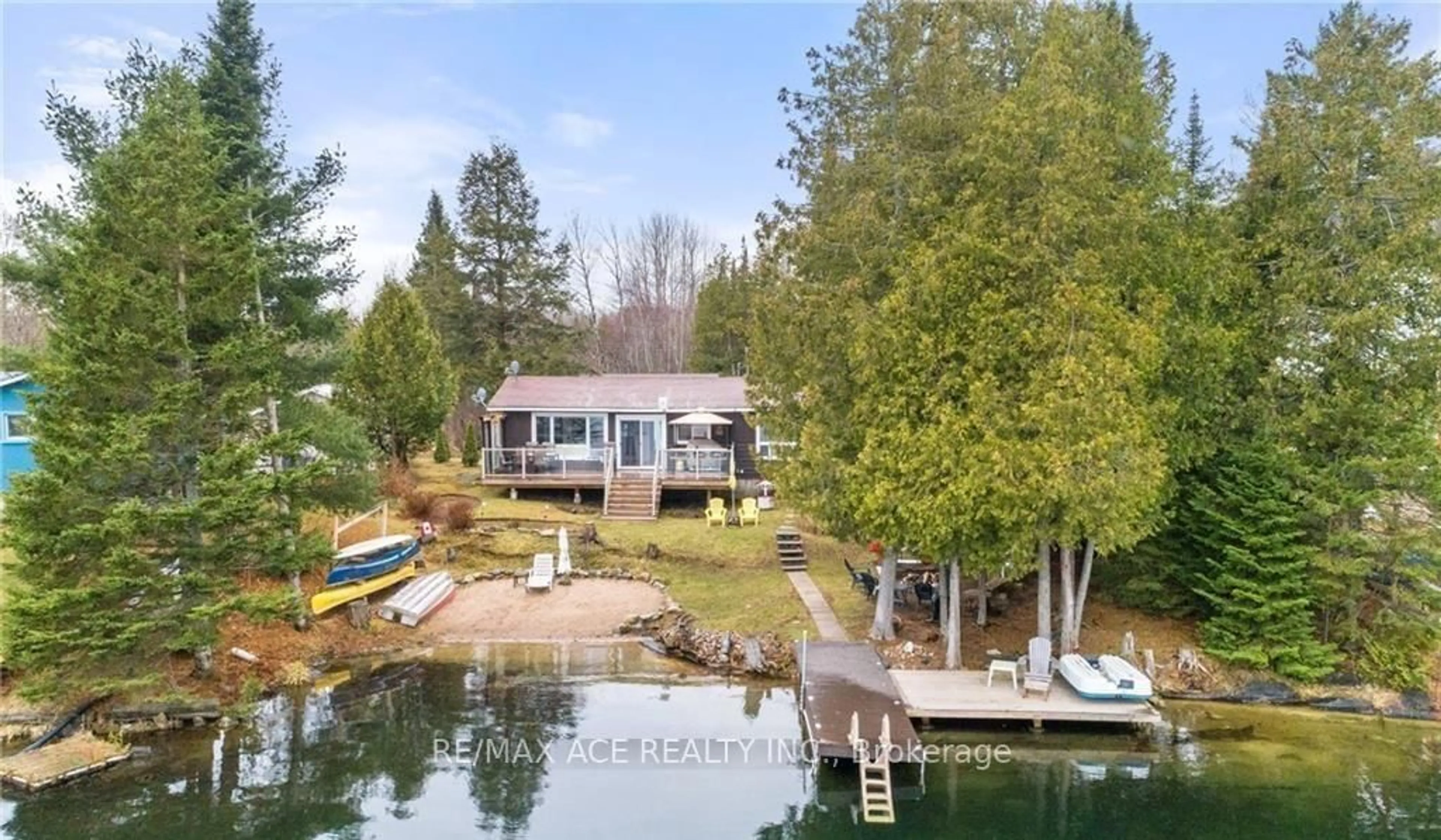 A pic from outside/outdoor area/front of a property/back of a property/a pic from drone, water/lake/river/ocean view for 1440 Clement Lake Rd, Highlands East Ontario K0L 3C0