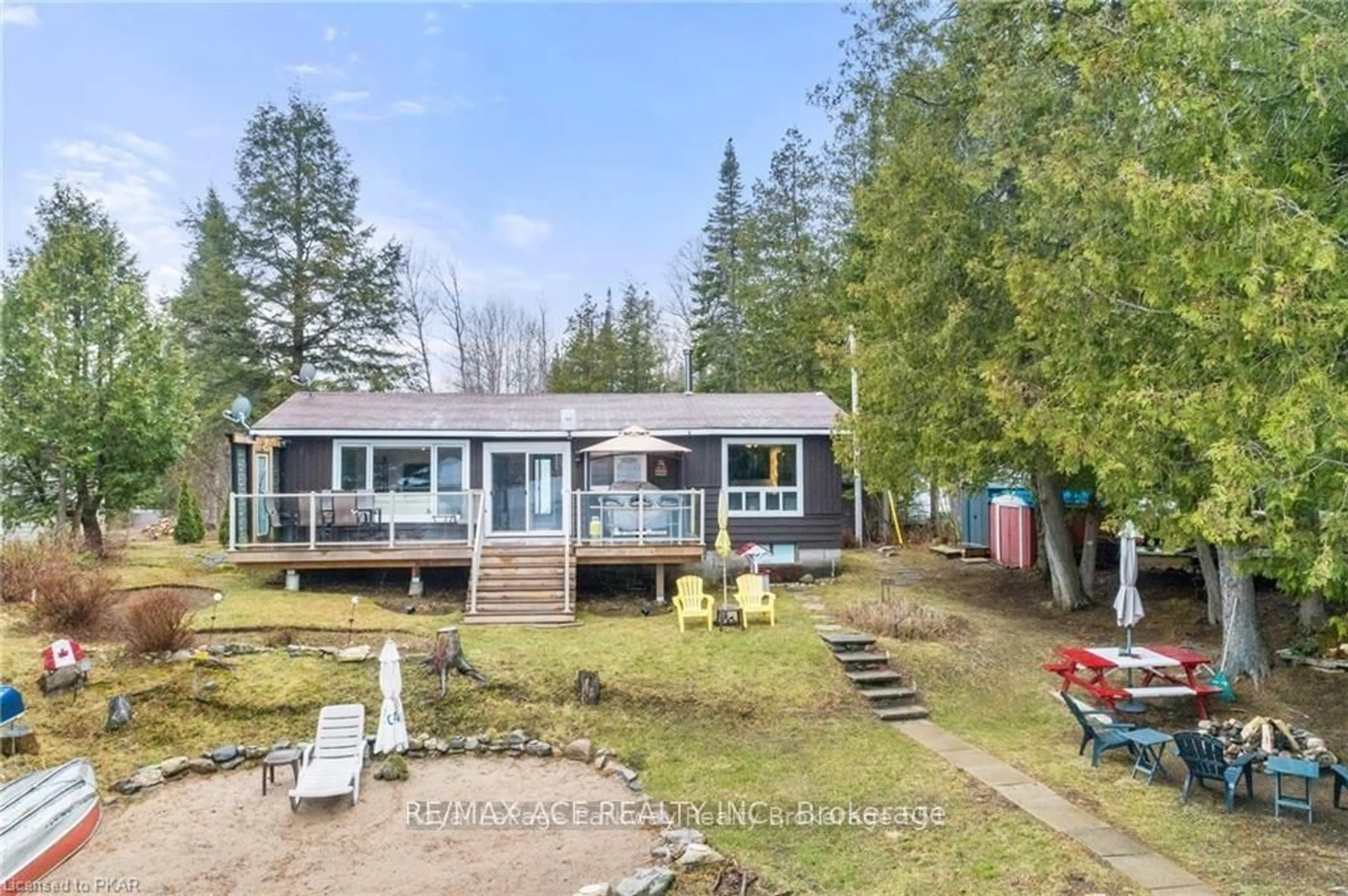 A pic from outside/outdoor area/front of a property/back of a property/a pic from drone, water/lake/river/ocean view for 1440 Clement Lake Rd, Highlands East Ontario K0L 3C0