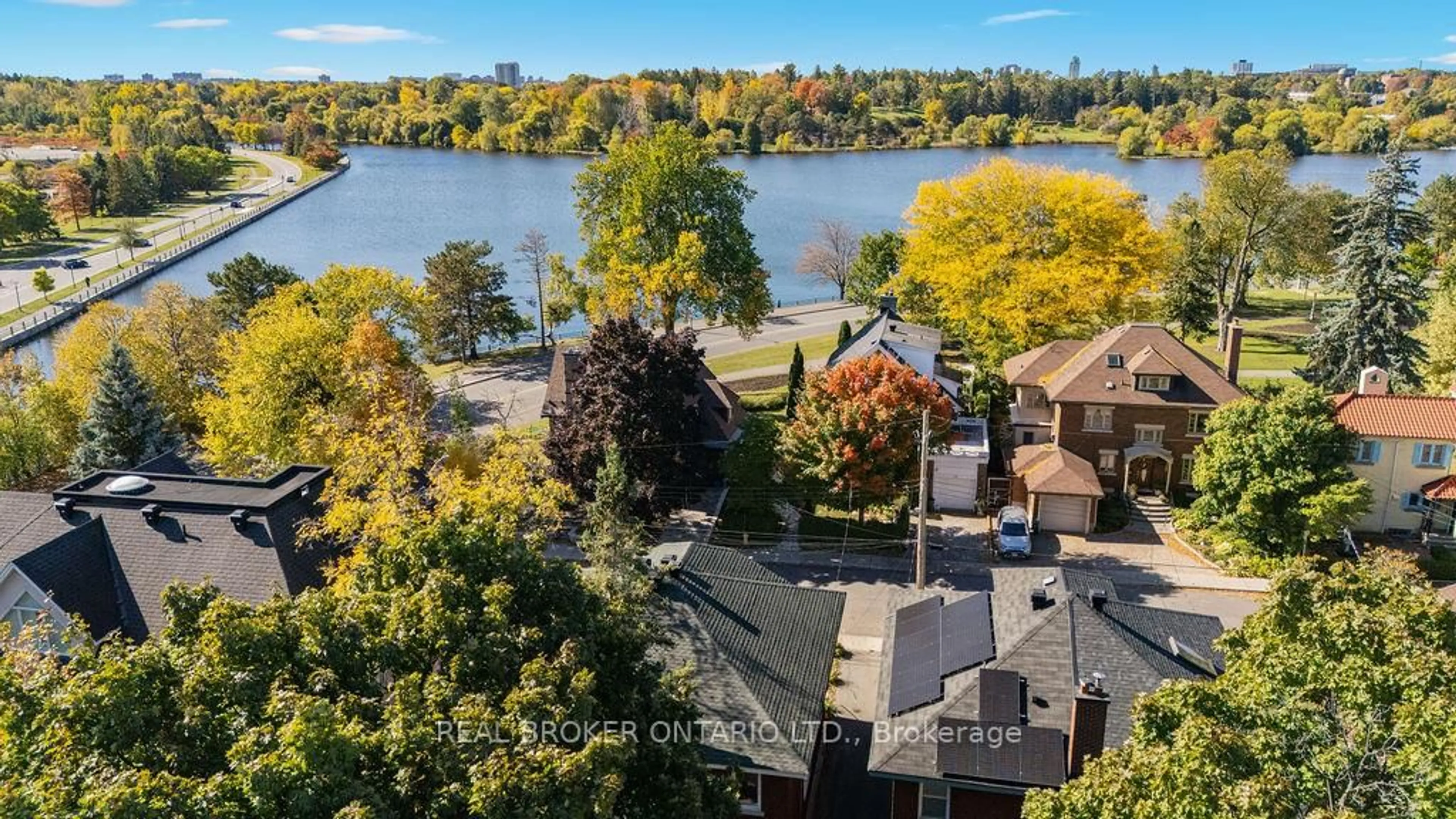 A pic from outside/outdoor area/front of a property/back of a property/a pic from drone, water/lake/river/ocean view for 23 Lakeview Terr, Ottawa Ontario K1S 3H3