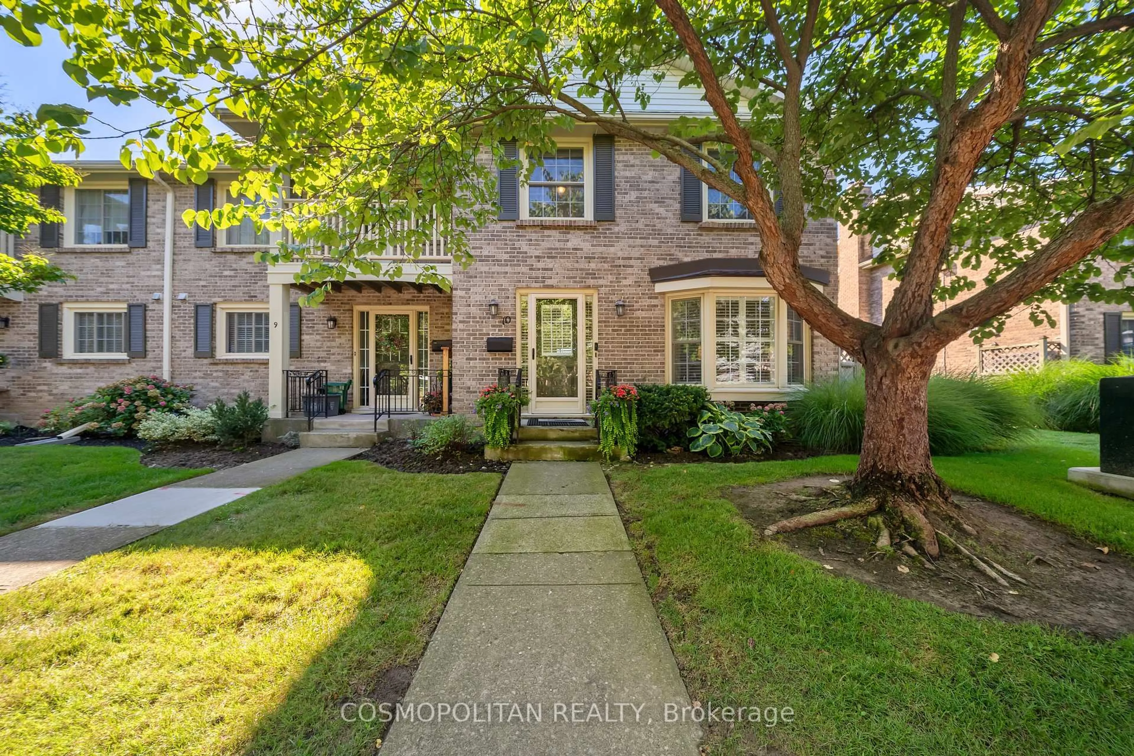 Home with brick exterior material, street for 409 Vine St #10, St. Catharines Ontario L2M 3S6