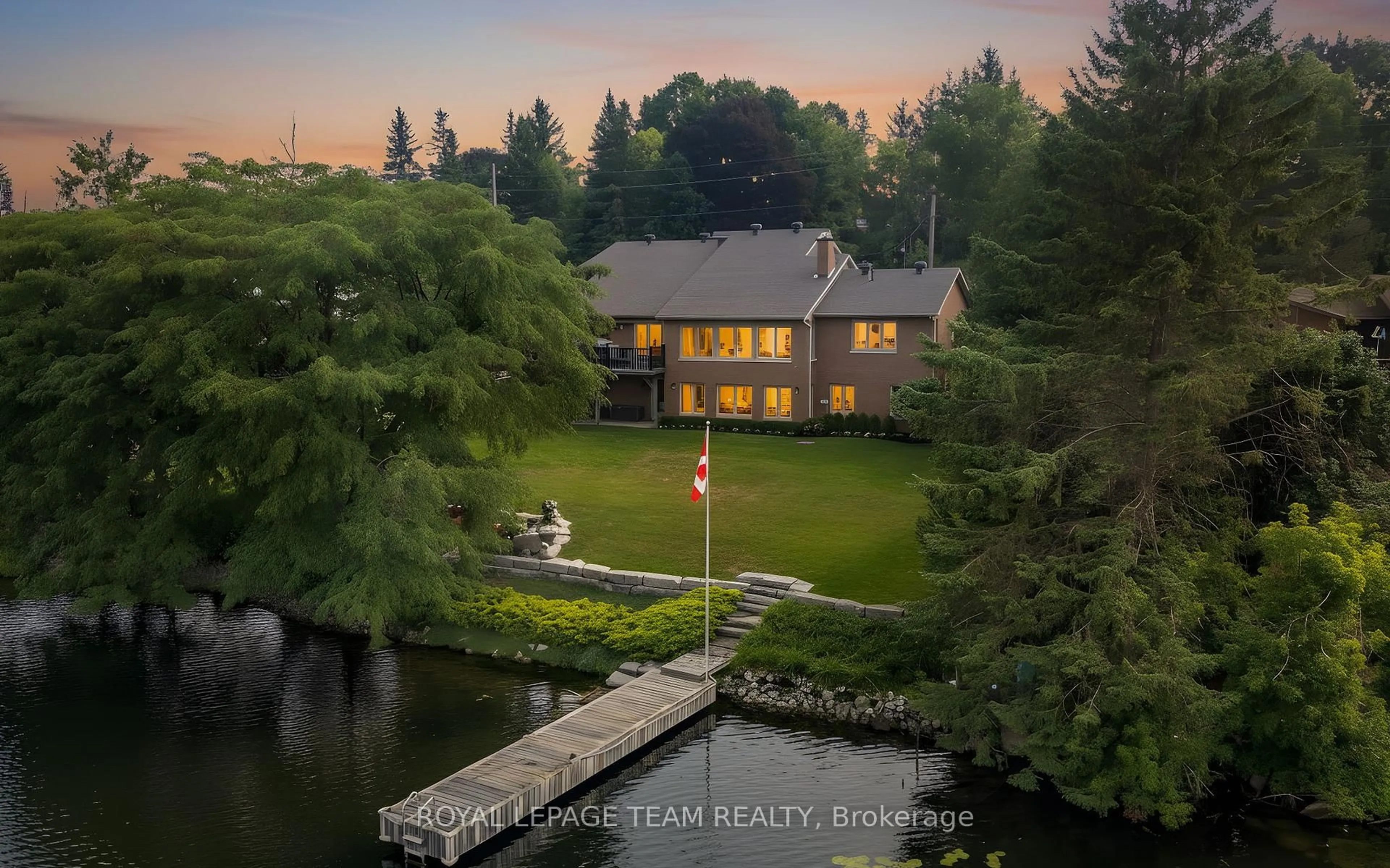 A pic from outside/outdoor area/front of a property/back of a property/a pic from drone, water/lake/river/ocean view for 1142 River Rd, Ottawa Ontario K4M 1B4