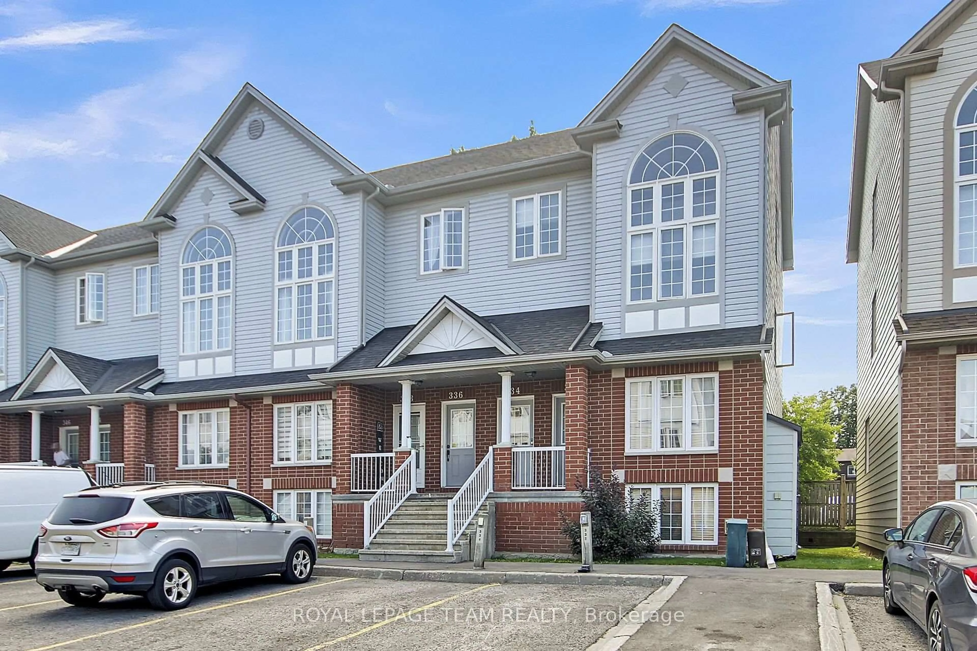Home with brick exterior material, street for 334 Wiffen Private, Ottawa Ontario K2H 1G3