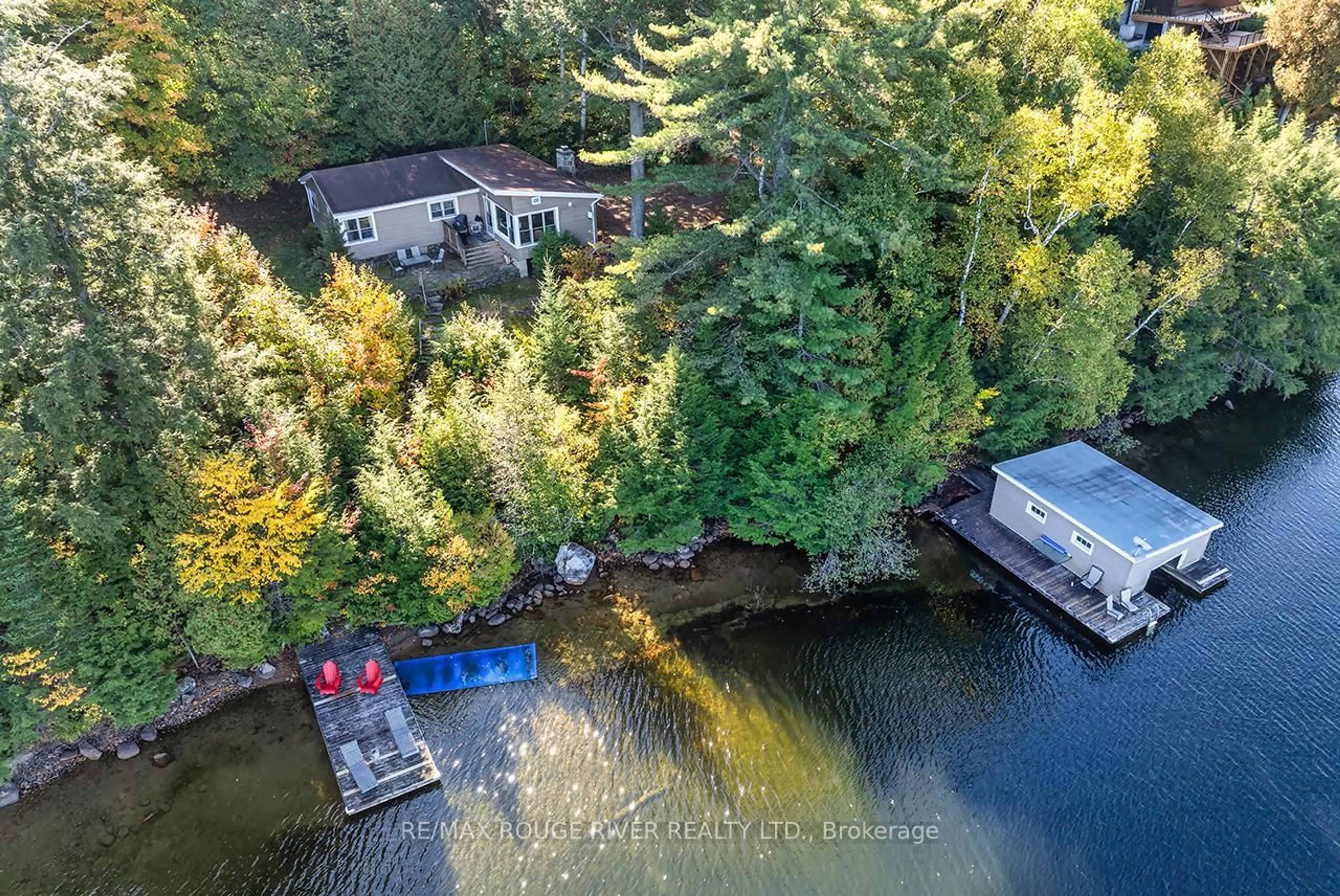 A pic from outside/outdoor area/front of a property/back of a property/a pic from drone, water/lake/river/ocean view for 5031 Muskoka Road 117 Highway, Lake of Bays Ontario P0A 1E0