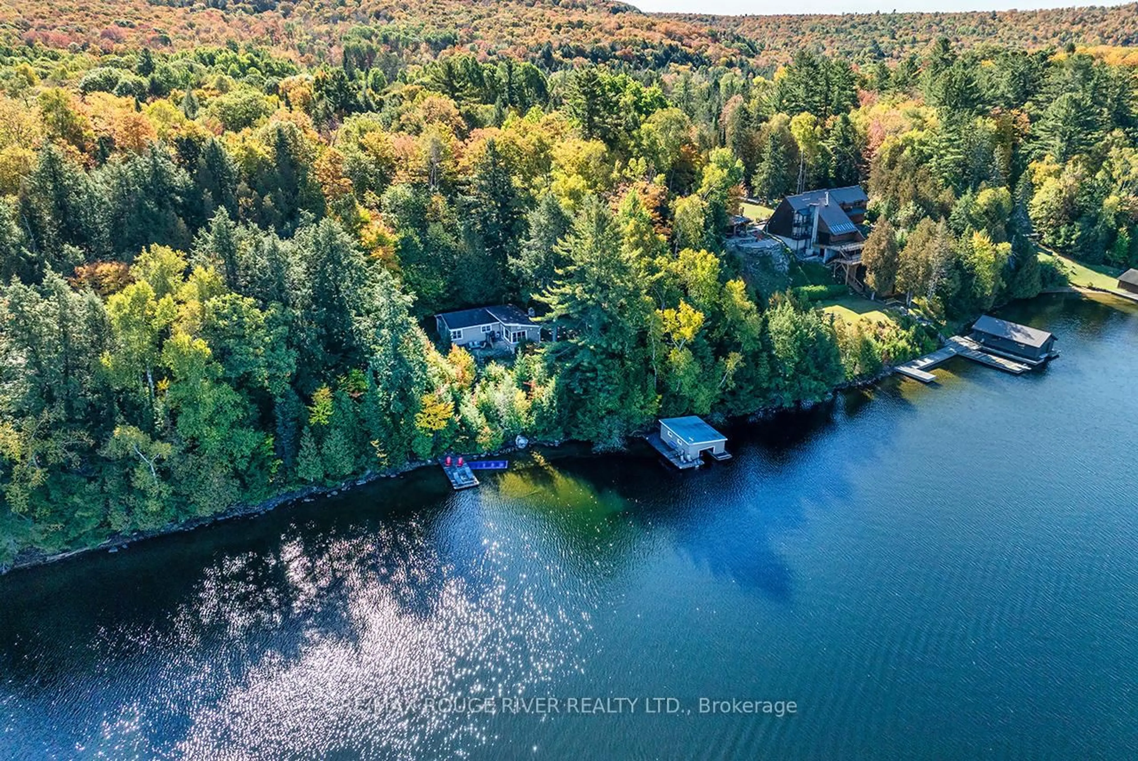 A pic from outside/outdoor area/front of a property/back of a property/a pic from drone, water/lake/river/ocean view for 5031 Muskoka Road 117 Highway, Lake of Bays Ontario P0A 1E0