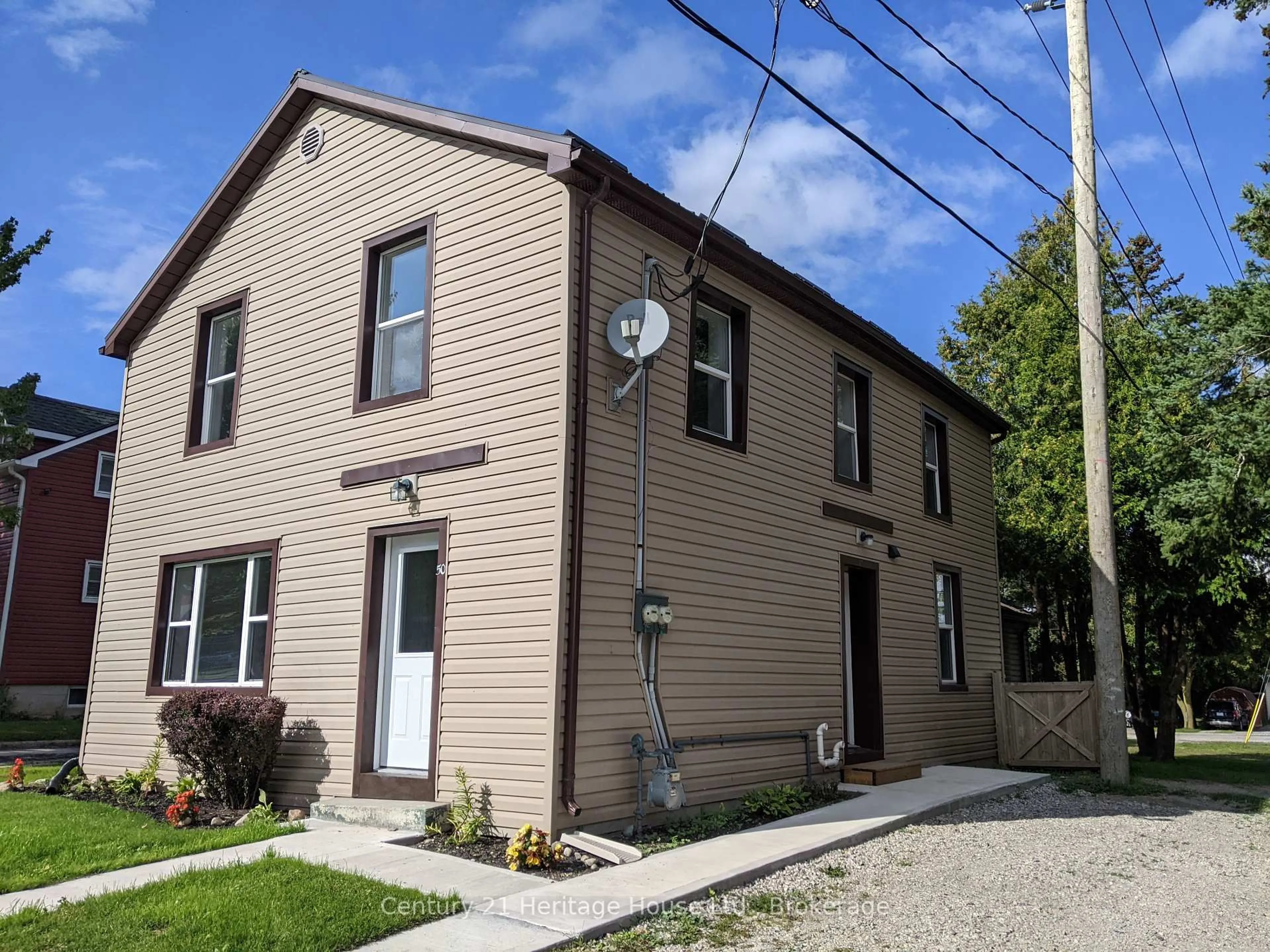 Home with brick exterior material, street for 50 Goderich St, Huron East Ontario N0K 1W0