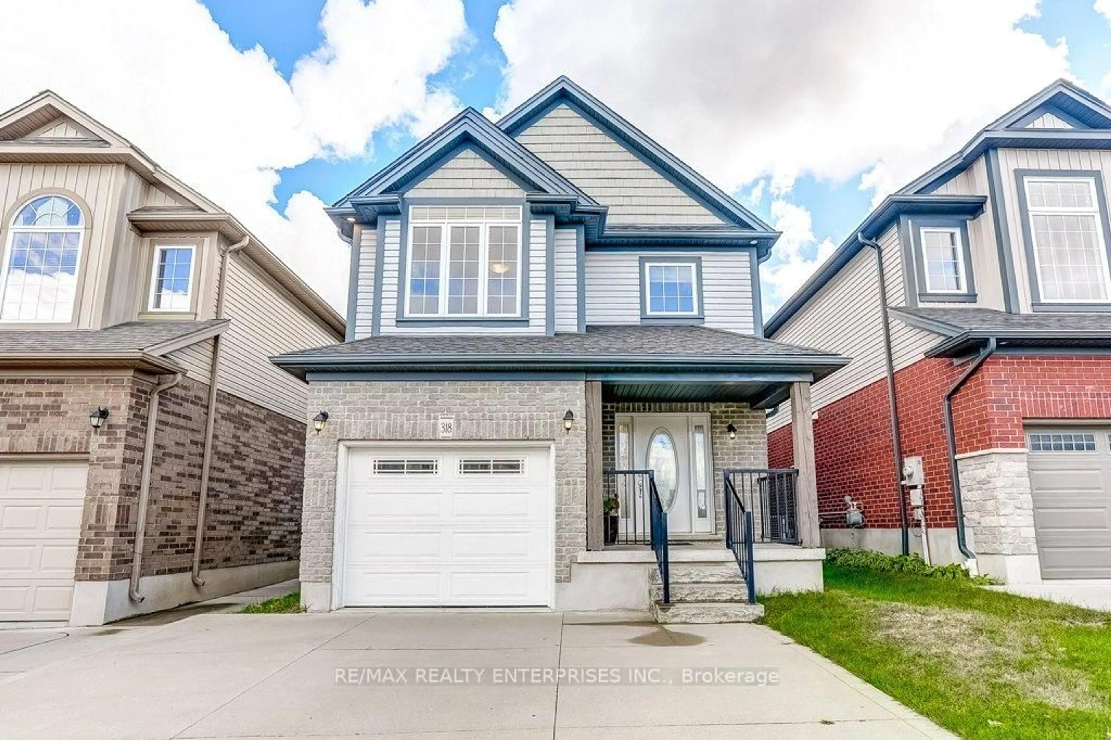 Home with vinyl exterior material, street for 318 Old Huron Rd, Kitchener Ontario N2R 1P8