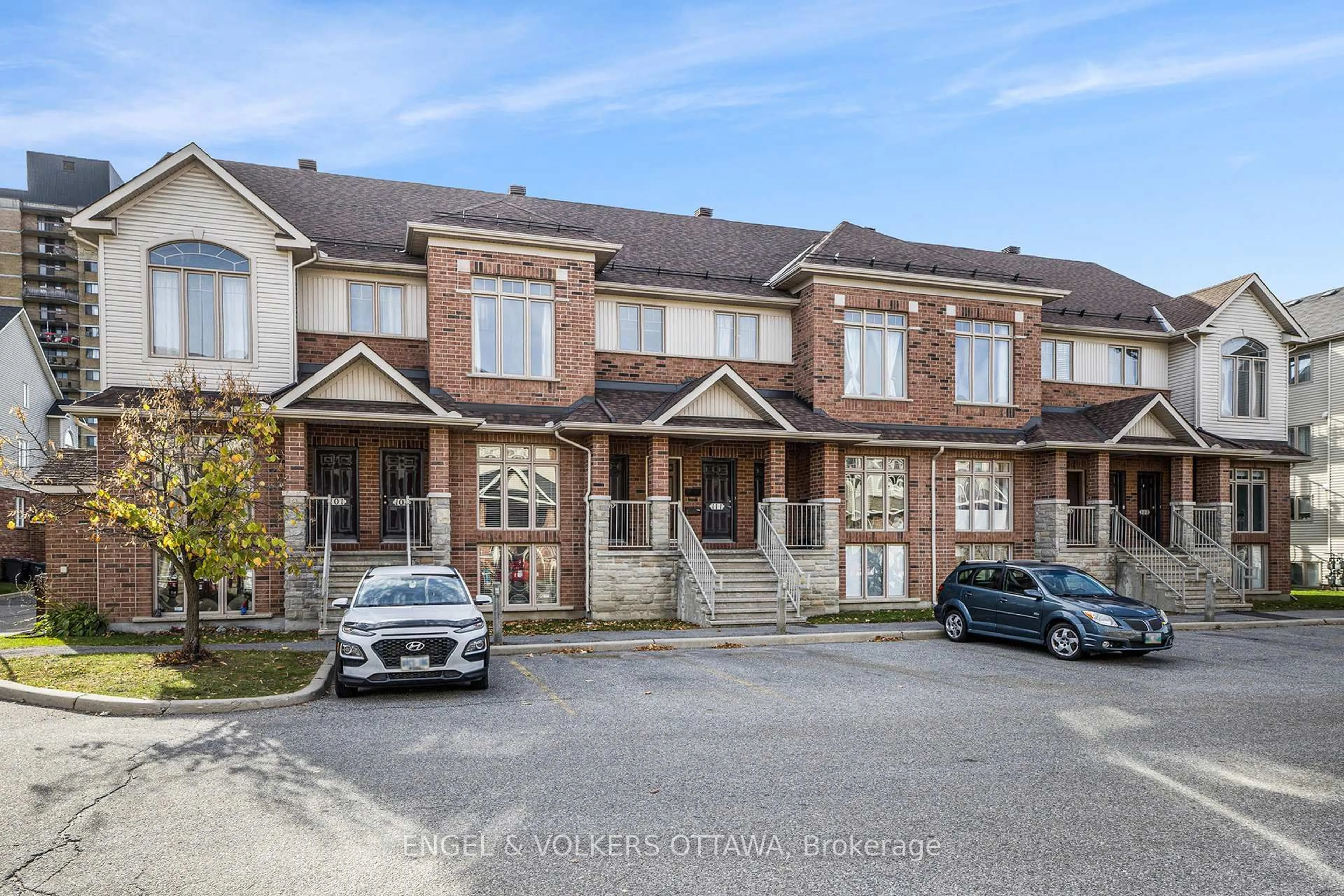 A pic from outside/outdoor area/front of a property/back of a property/a pic from drone, street for 1512 Walkley Rd #107, Ottawa Ontario K1V 2G7