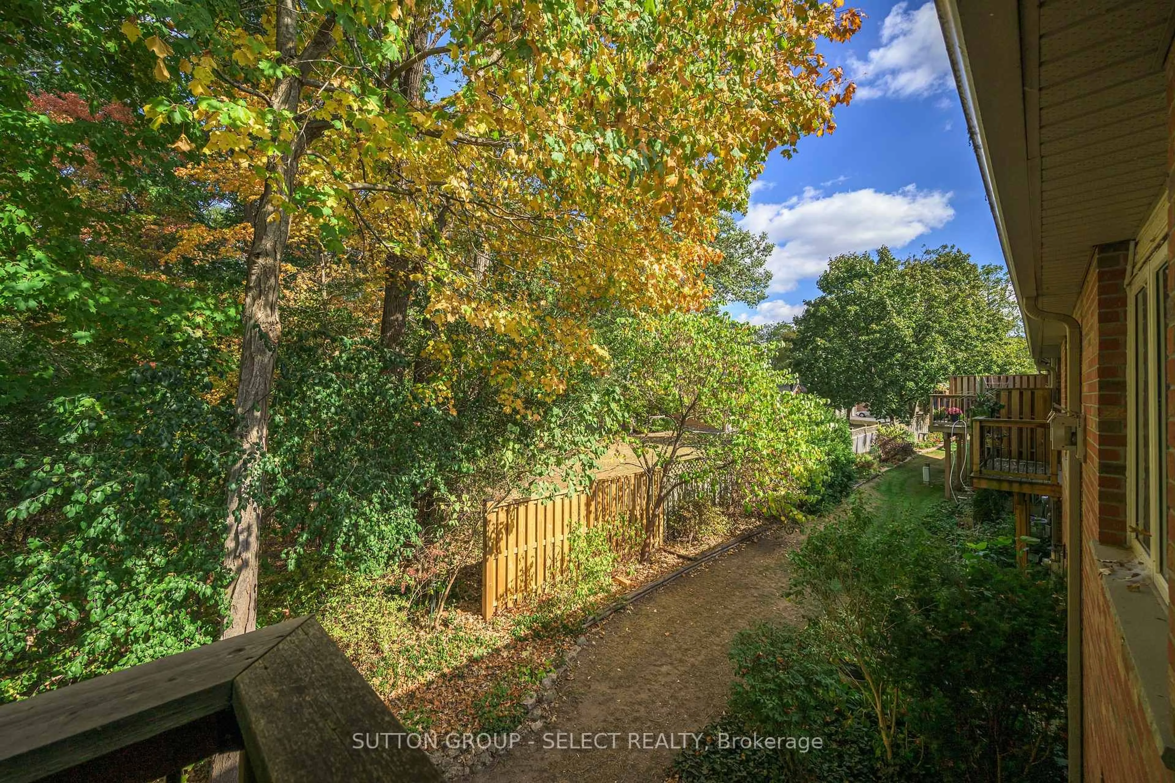 A pic from outside/outdoor area/front of a property/back of a property/a pic from drone, forest/trees view for 1337 Commissioners Rd #11, London South Ontario N6K 4V2