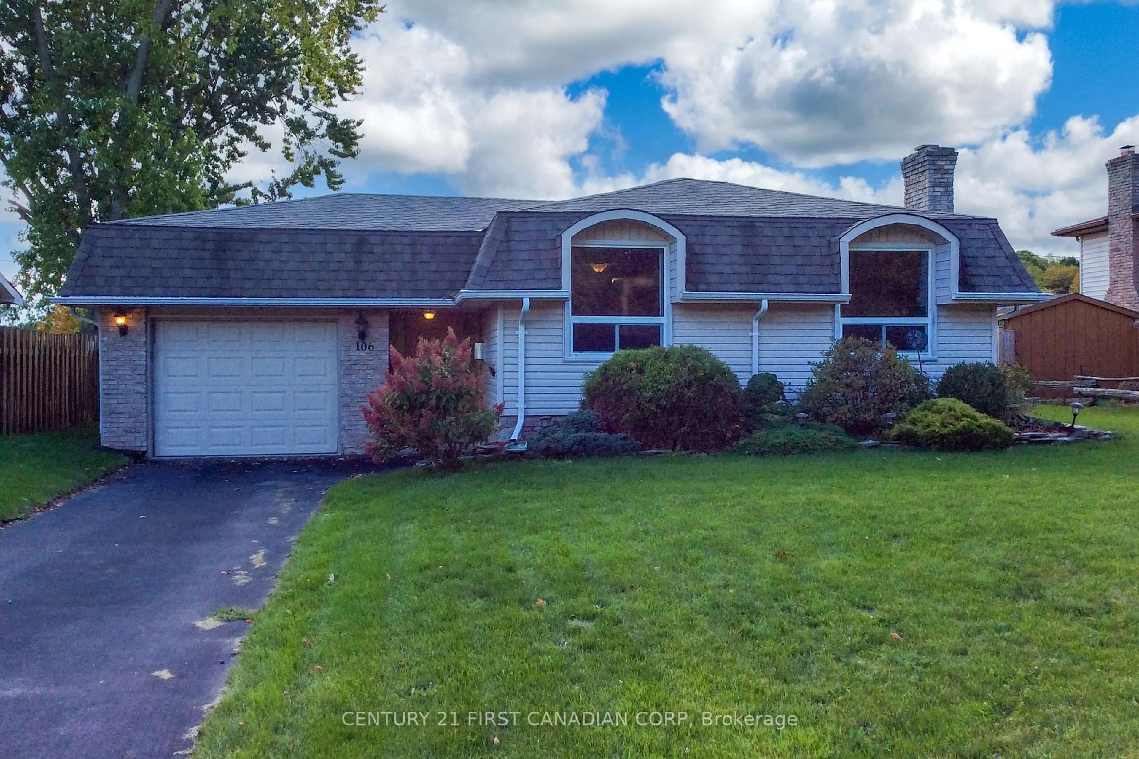 Home with vinyl exterior material, street for 106 Angelo Dr, West Elgin Ontario N0L 2P0