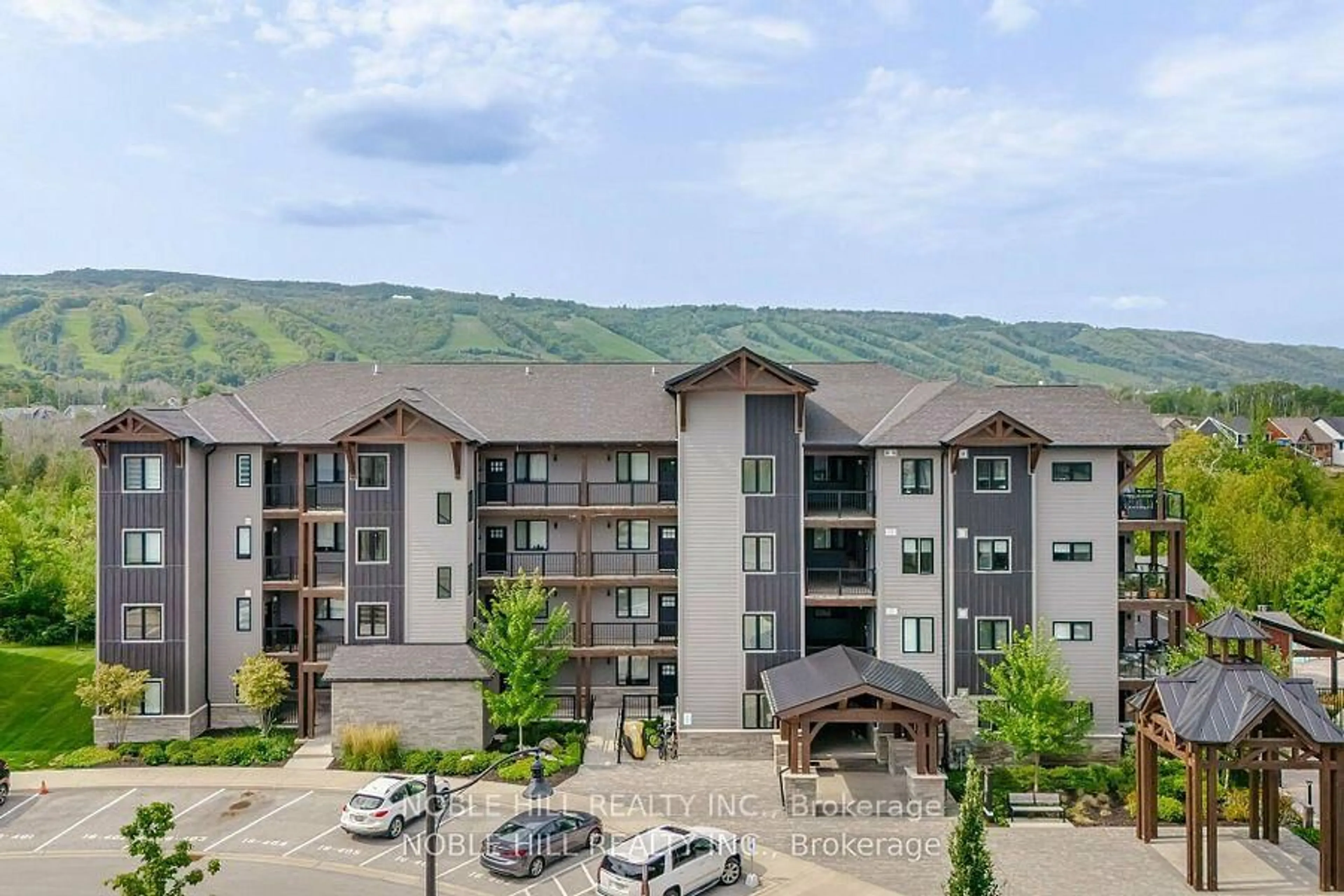 A pic from outside/outdoor area/front of a property/back of a property/a pic from drone, mountain view for 16 Beckwith Lane #403, Blue Mountains Ontario L9Y 3B6