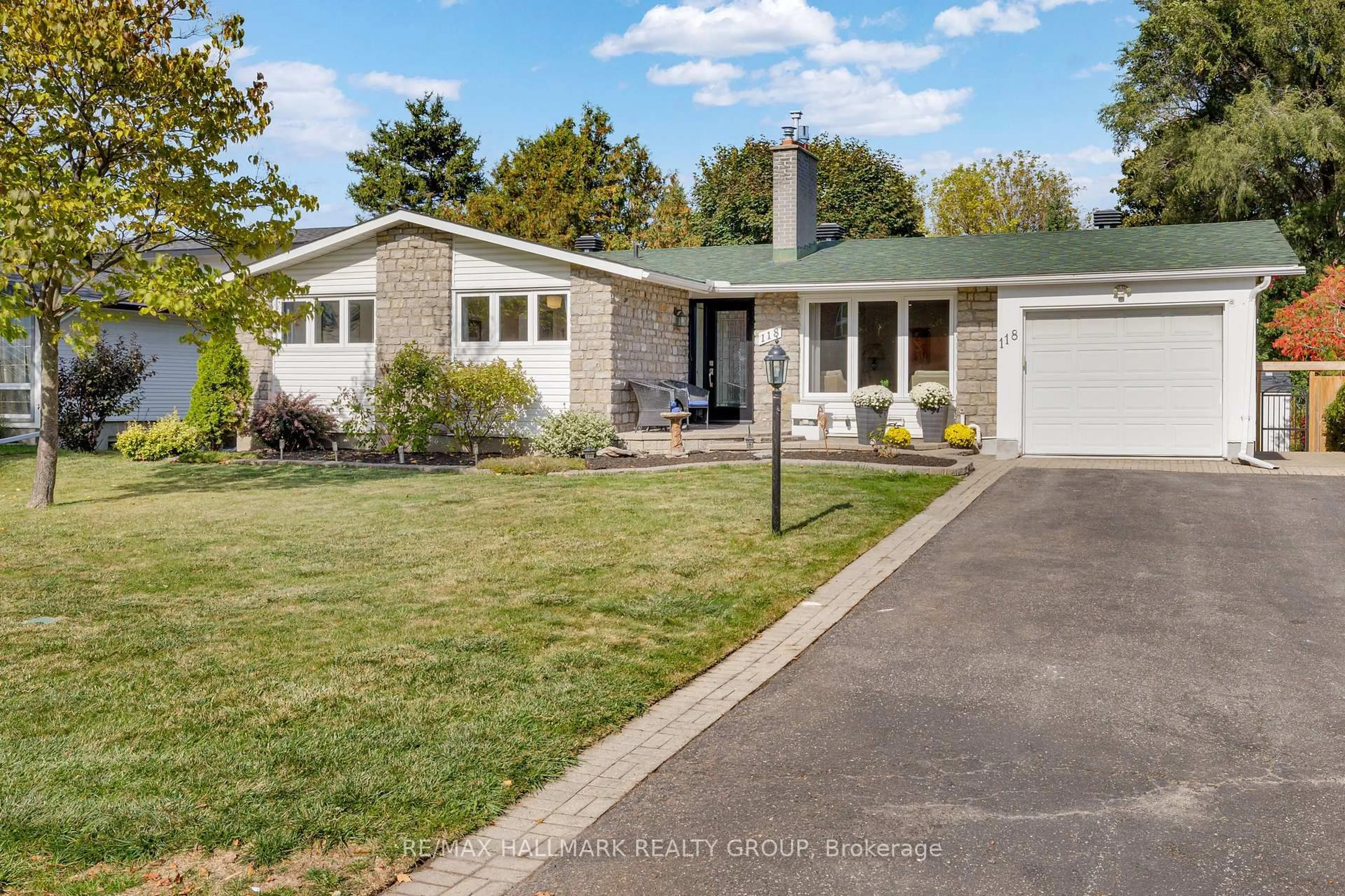 Home with vinyl exterior material, street for 118 Queensline Dr, Ottawa Ontario K2H 7J5