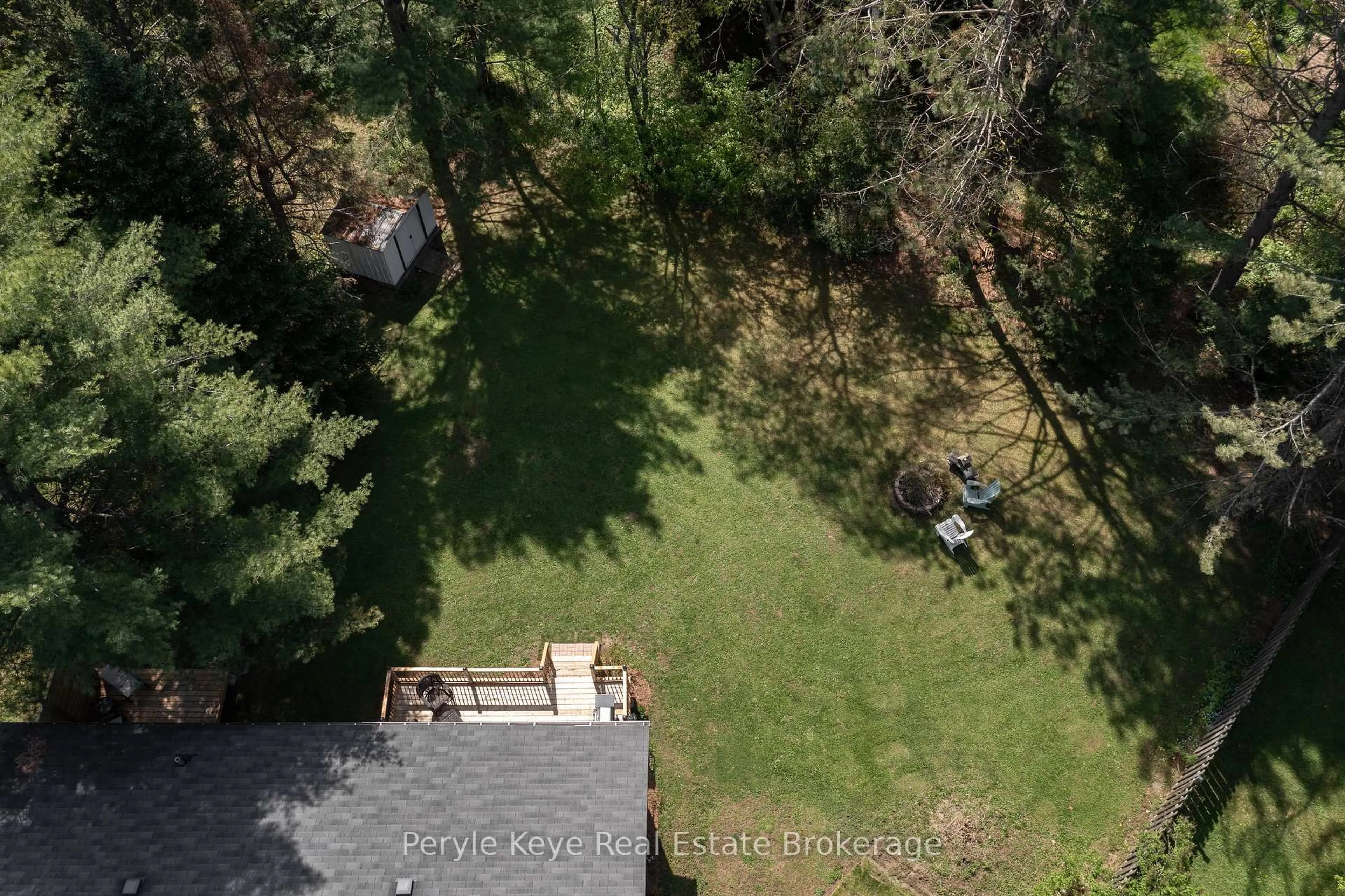 A pic from outside/outdoor area/front of a property/back of a property/a pic from drone, forest/trees view for 38 Andrea Dr, Bracebridge Ontario P1L 1C5