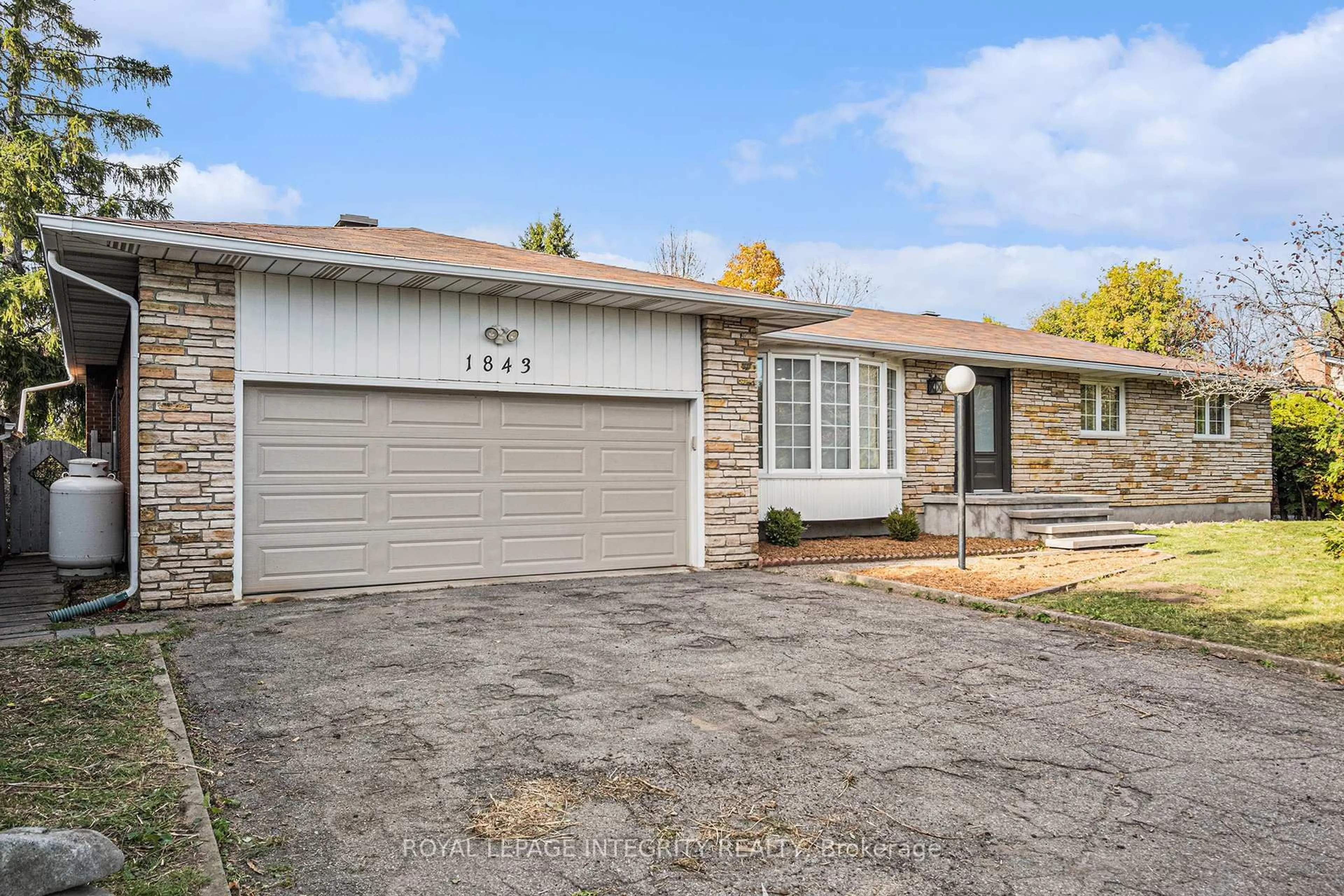 Home with brick exterior material, street for 1843 Rideau Rd, Ottawa Ontario K1X 1E1