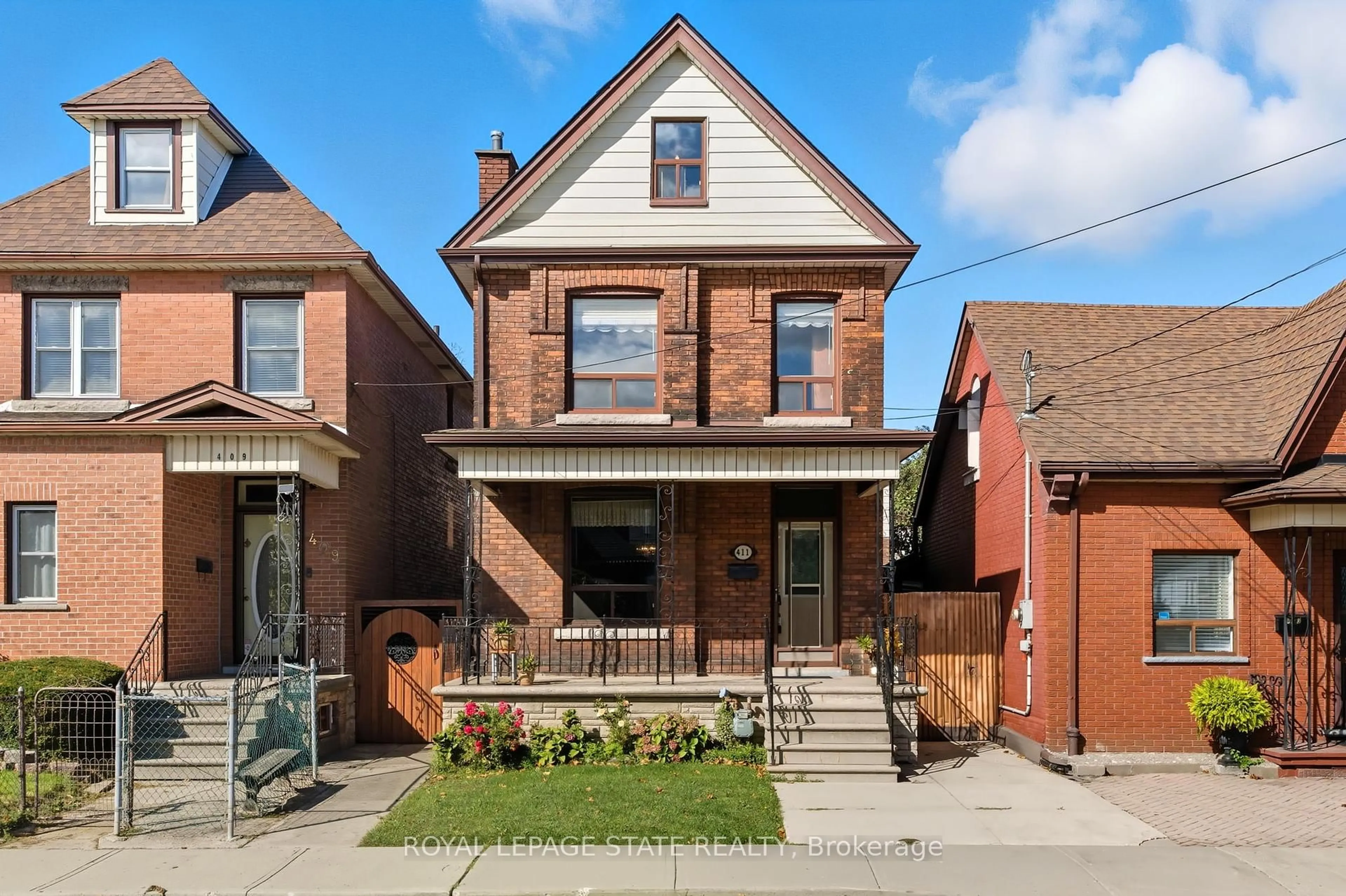 Home with brick exterior material, street for 411 Catharine St, Hamilton Ontario L8L 4T7