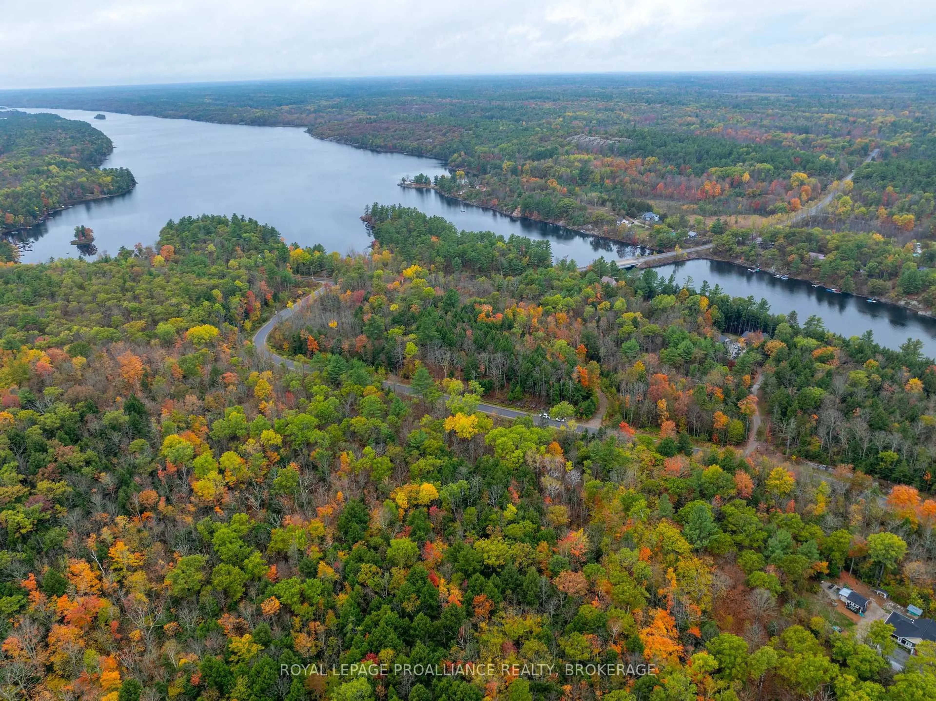 A pic from outside/outdoor area/front of a property/back of a property/a pic from drone, water/lake/river/ocean view for 1060 Nordic Rd, Arden Ontario K0H 1B0
