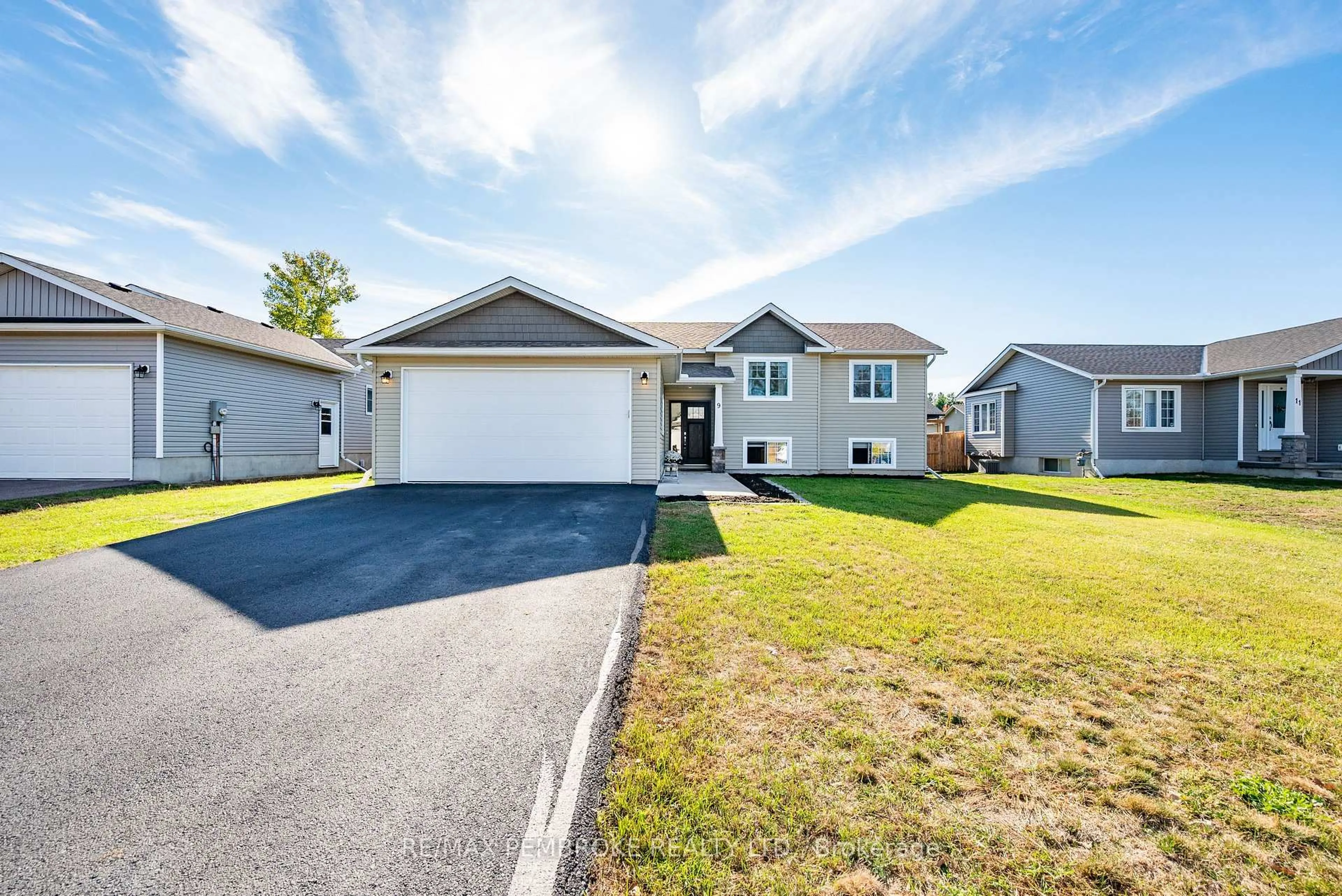 Home with vinyl exterior material, street for 9 Terrance Dr, Petawawa Ontario K8H 0G3