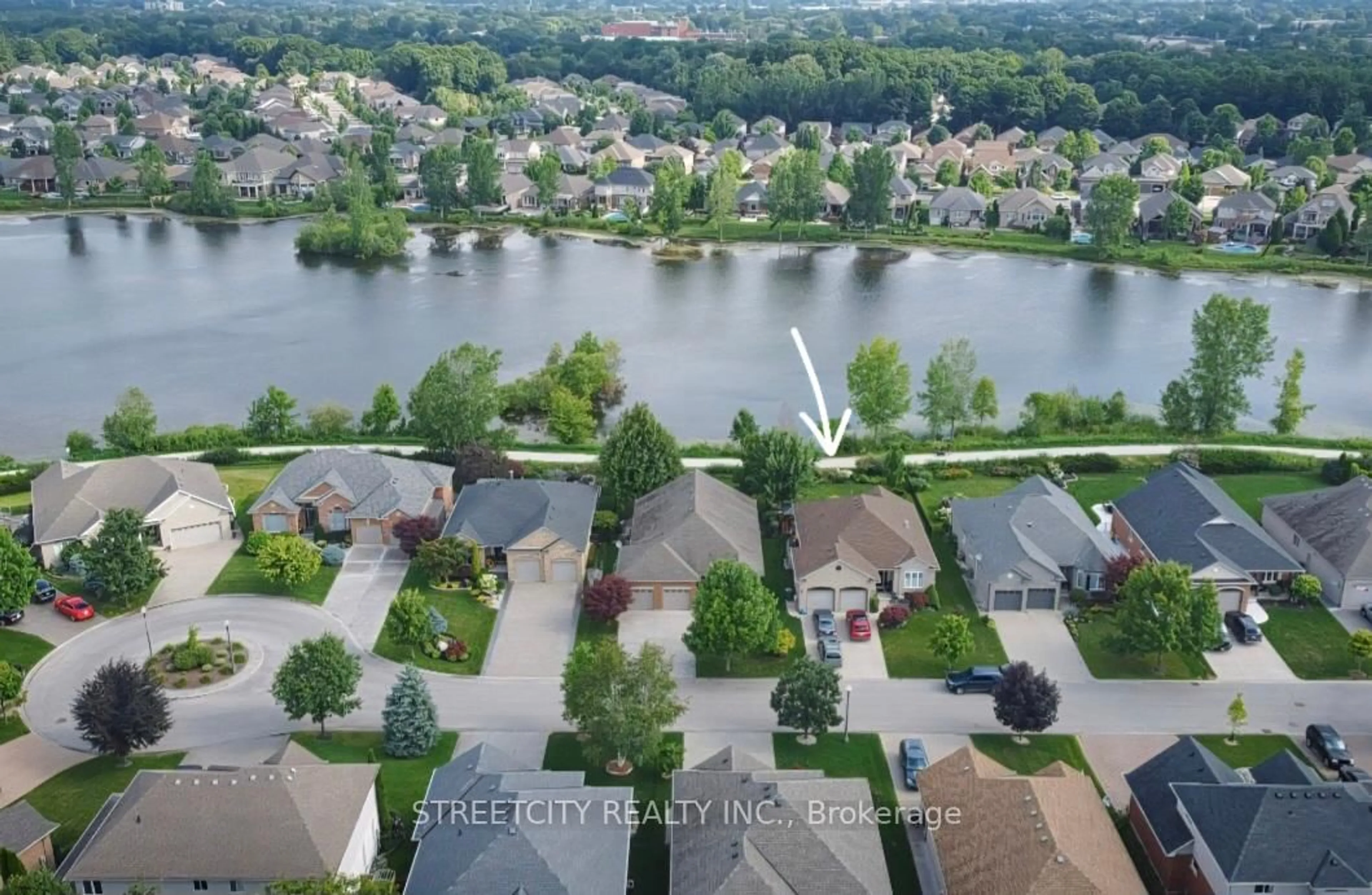 A pic from outside/outdoor area/front of a property/back of a property/a pic from drone, water/lake/river/ocean view for 21 Beechwood Circ, St. Thomas Ontario N5R 6K4