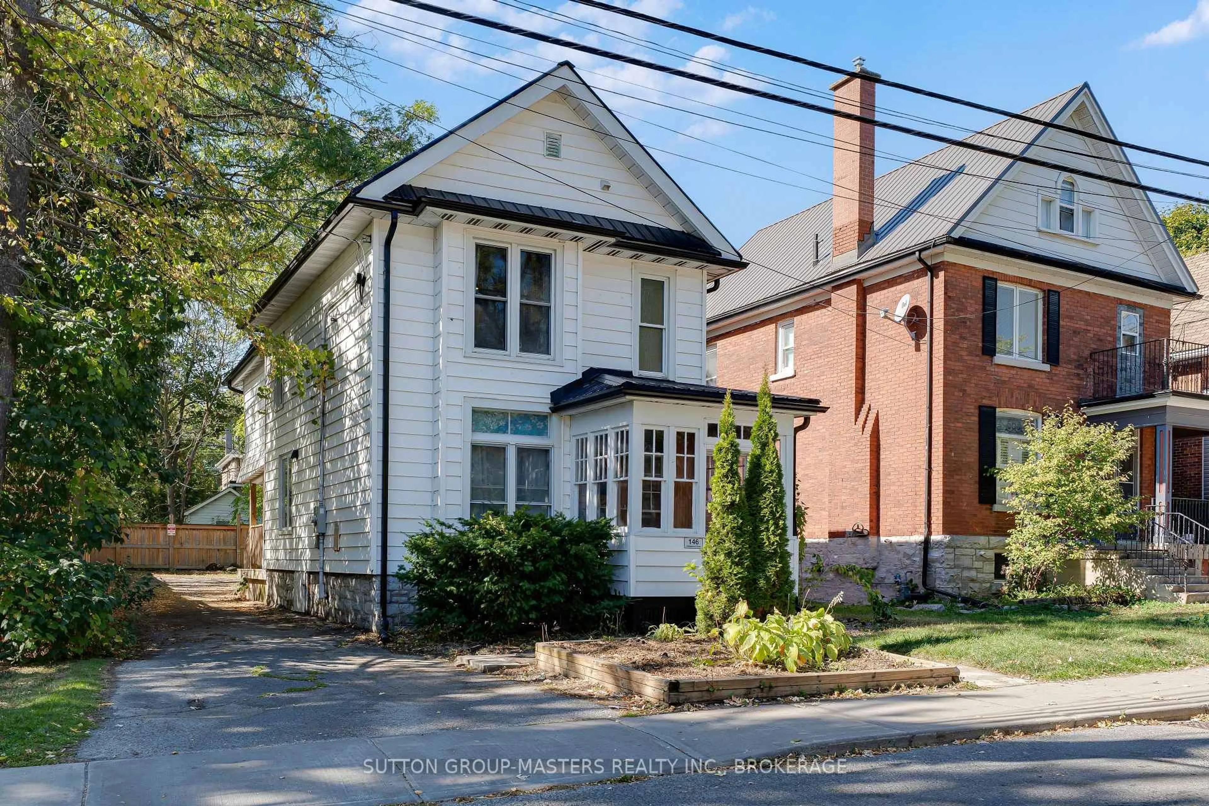 Home with brick exterior material, street for 146 Collingwood St, Kingston Ontario K7L 3X5