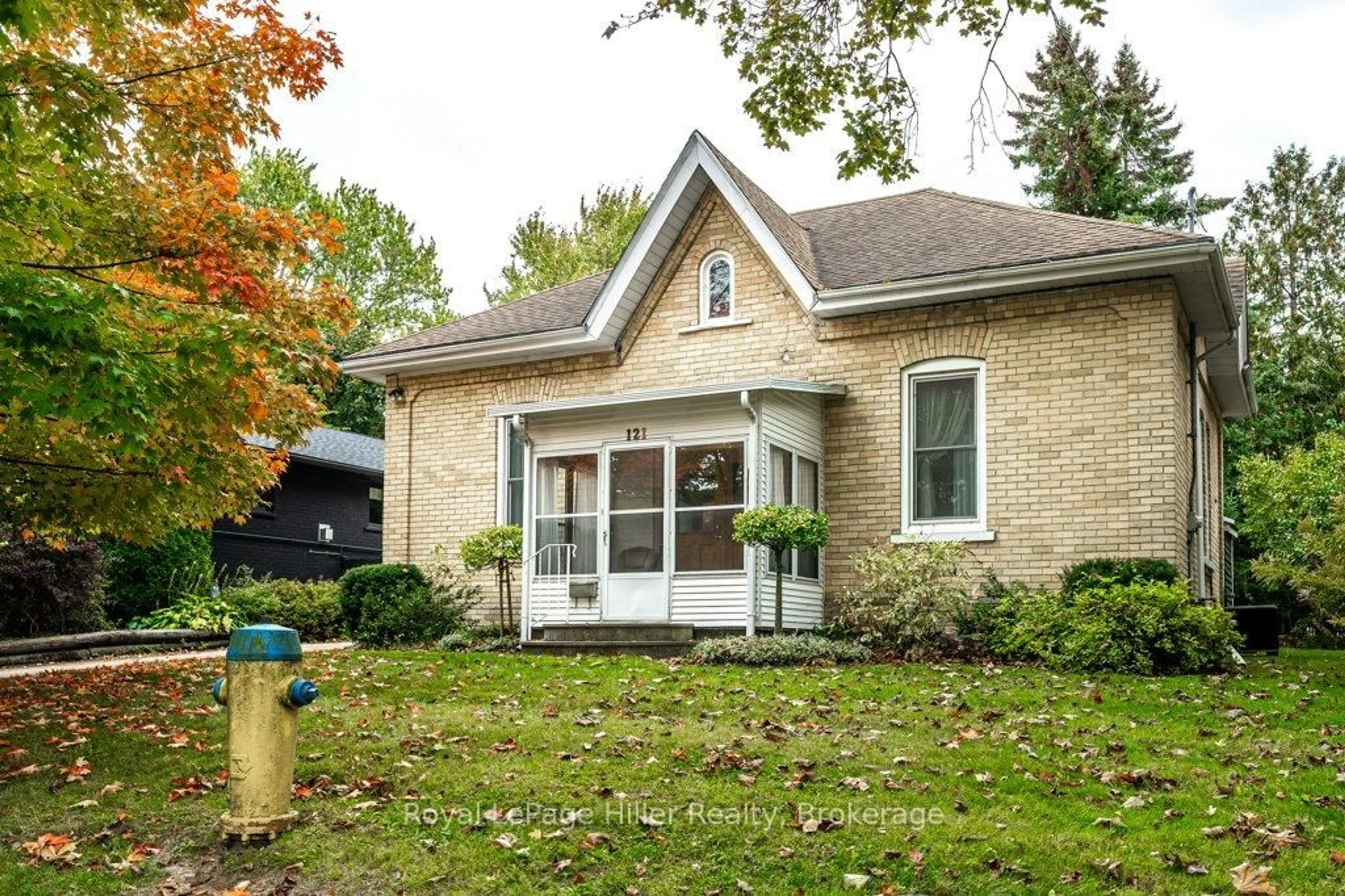 Home with brick exterior material, street for 121 Water St, Stratford Ontario N5A 3C3