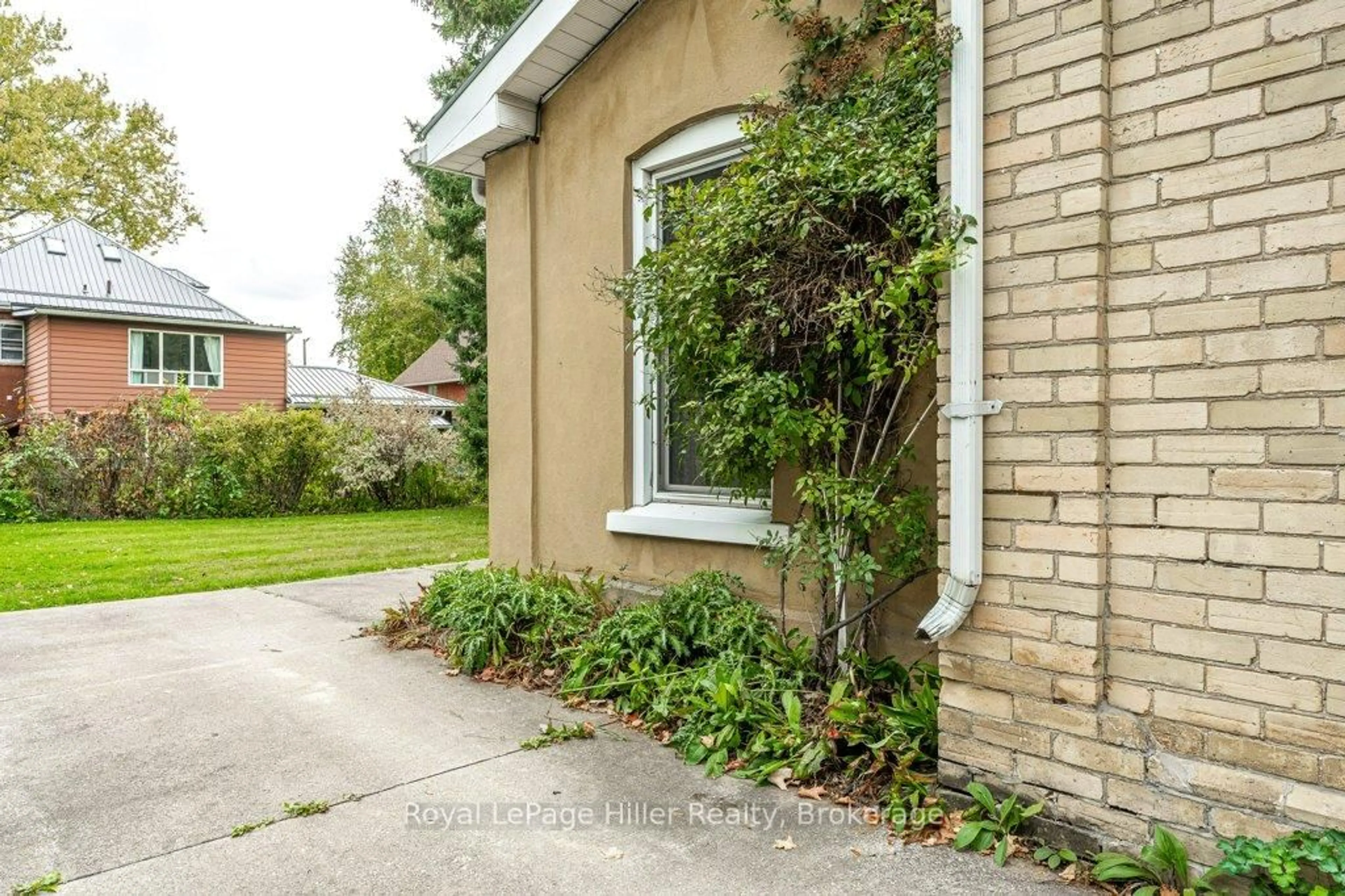 Home with brick exterior material, street for 121 Water St, Stratford Ontario N5A 3C3