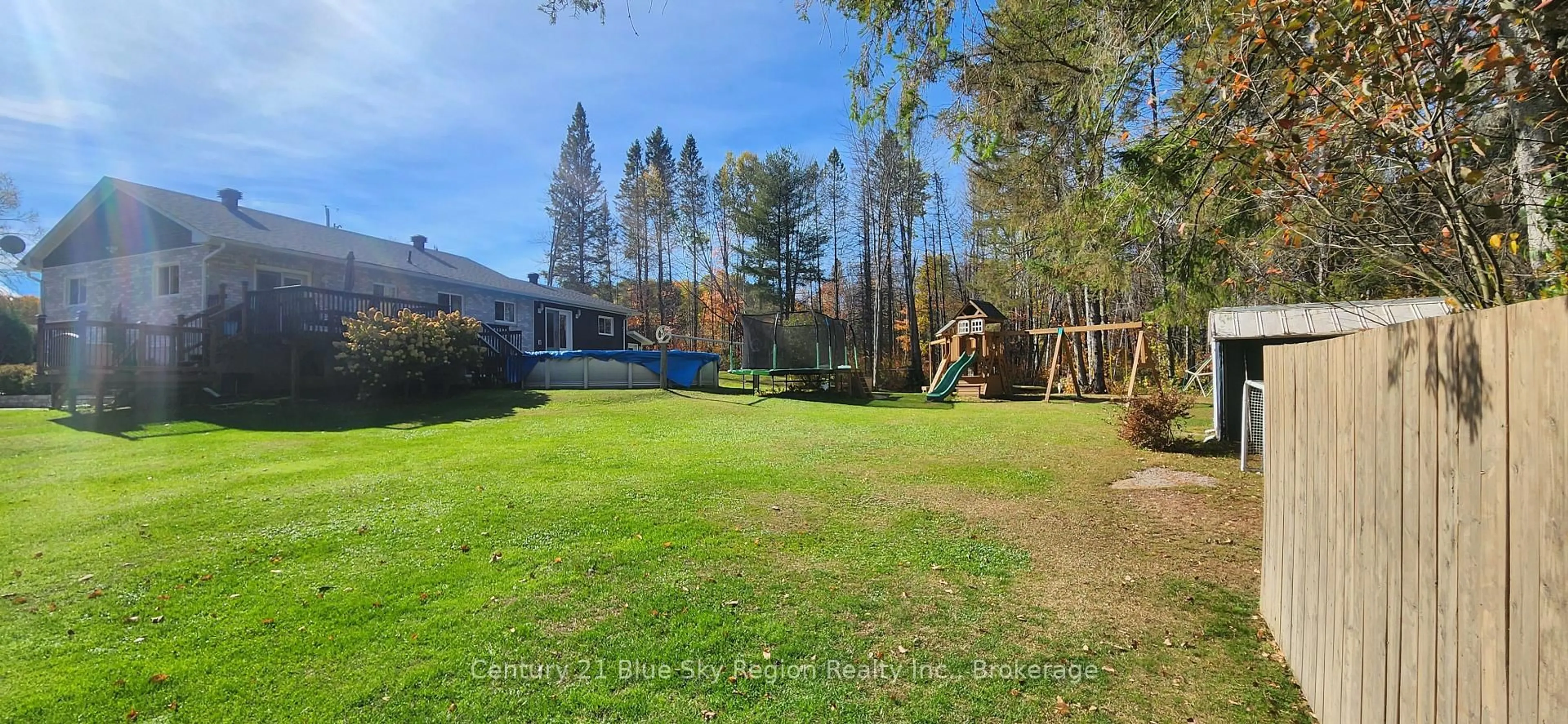 A pic from outside/outdoor area/front of a property/back of a property/a pic from drone, forest/trees view for 223 Development Rd, Bonfield Ontario P0H 1E0