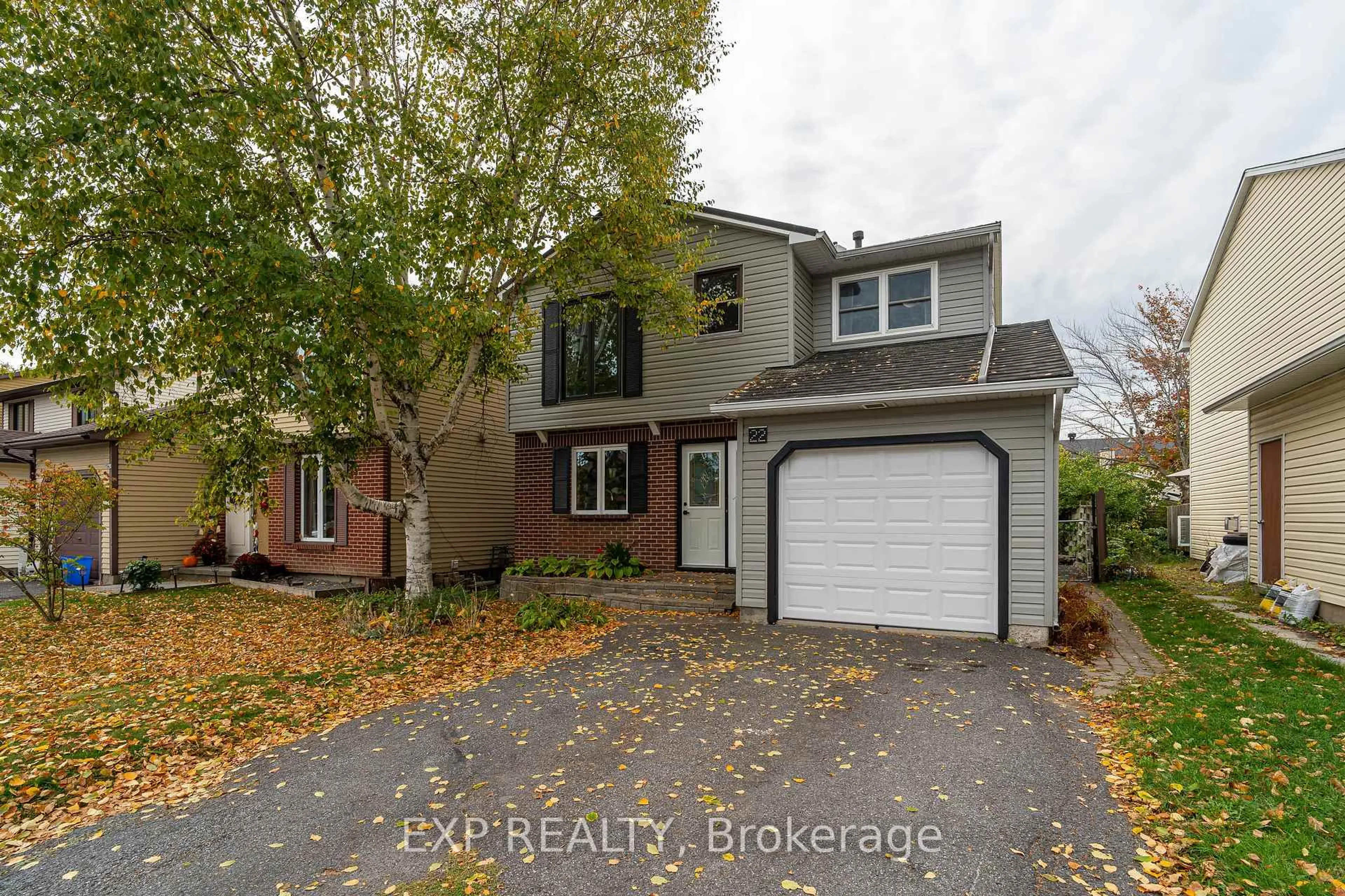 Home with brick exterior material, street for 22 Rickey Pl, Kanata Ontario K2L 2E3