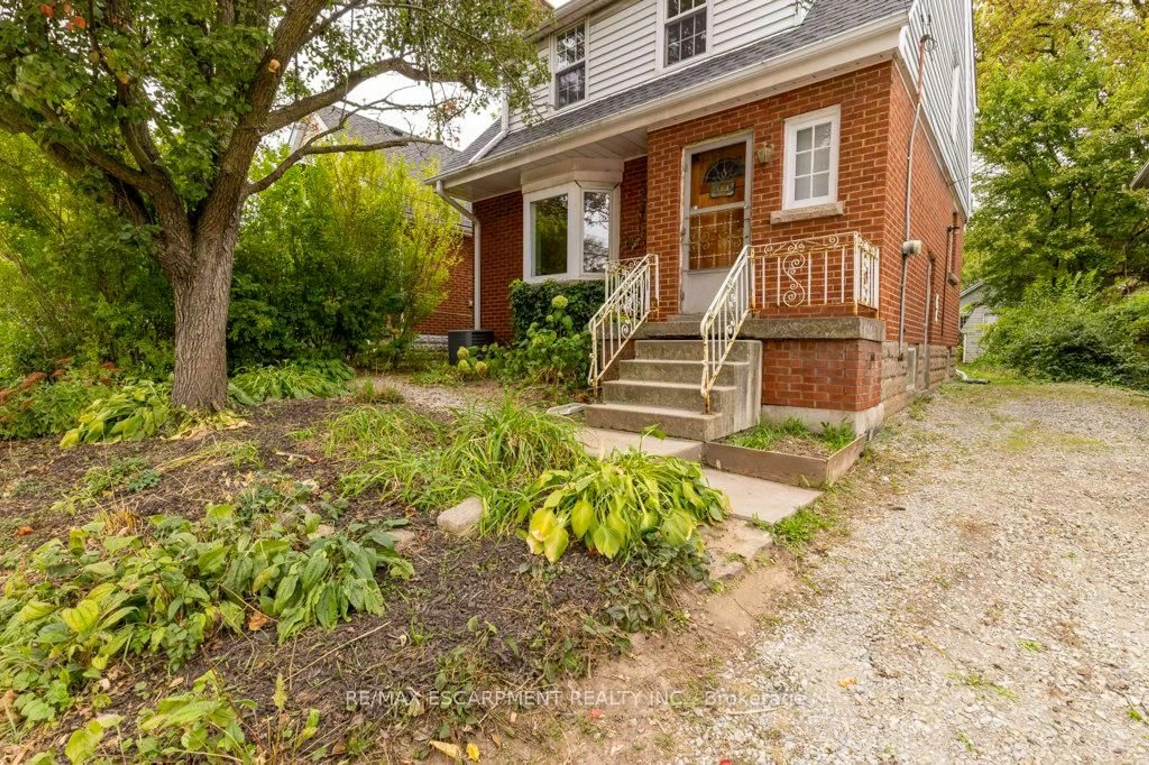 Home with brick exterior material, street for 144 WHITNEY Ave, Hamilton Ontario L8S 2G7