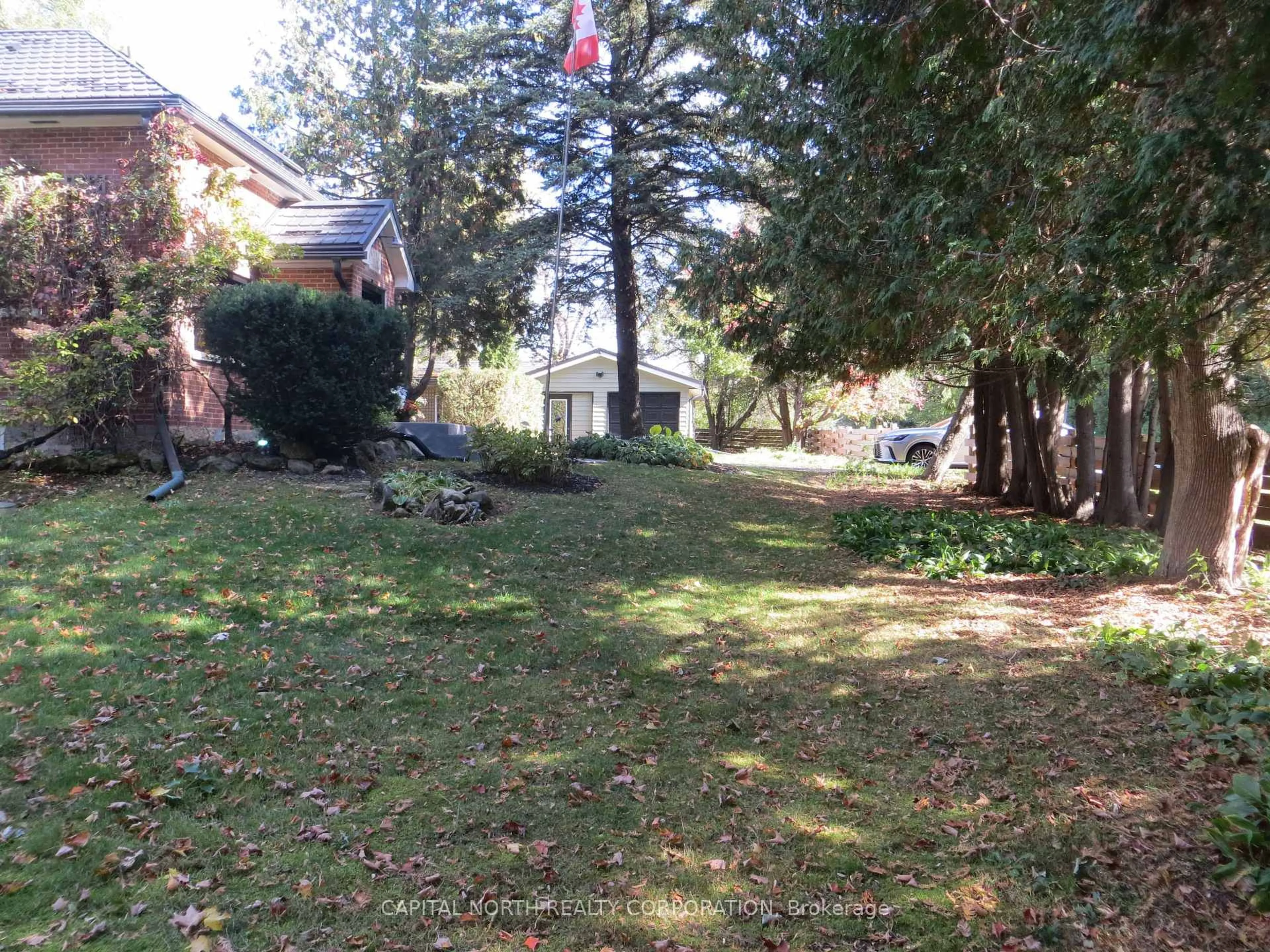 A pic from outside/outdoor area/front of a property/back of a property/a pic from drone, street for 286351 10th Sdrd, Mono Ontario L9W 6P7